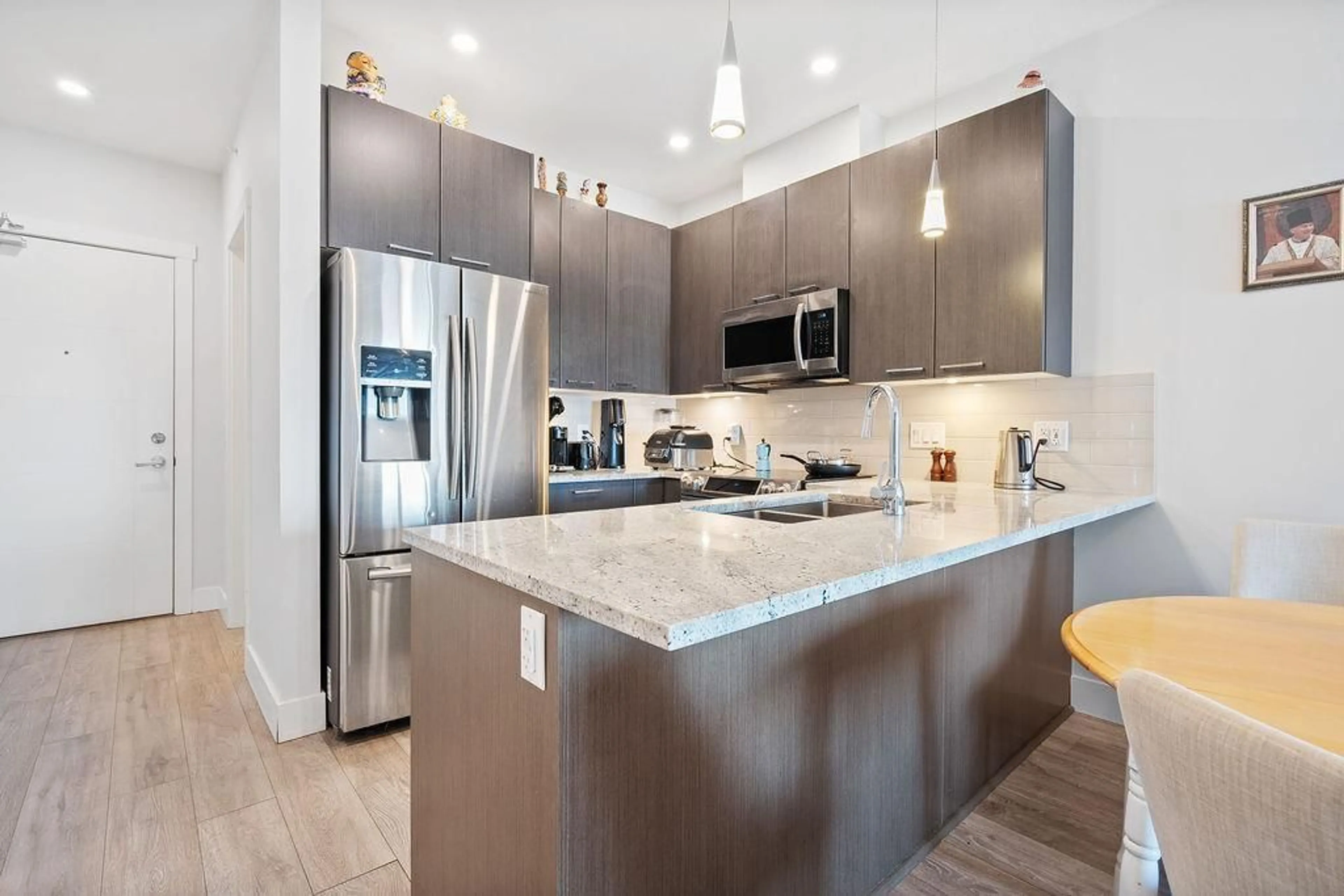 Open concept kitchen, unknown for 407 - 20175 53, Langley British Columbia V3A0J8