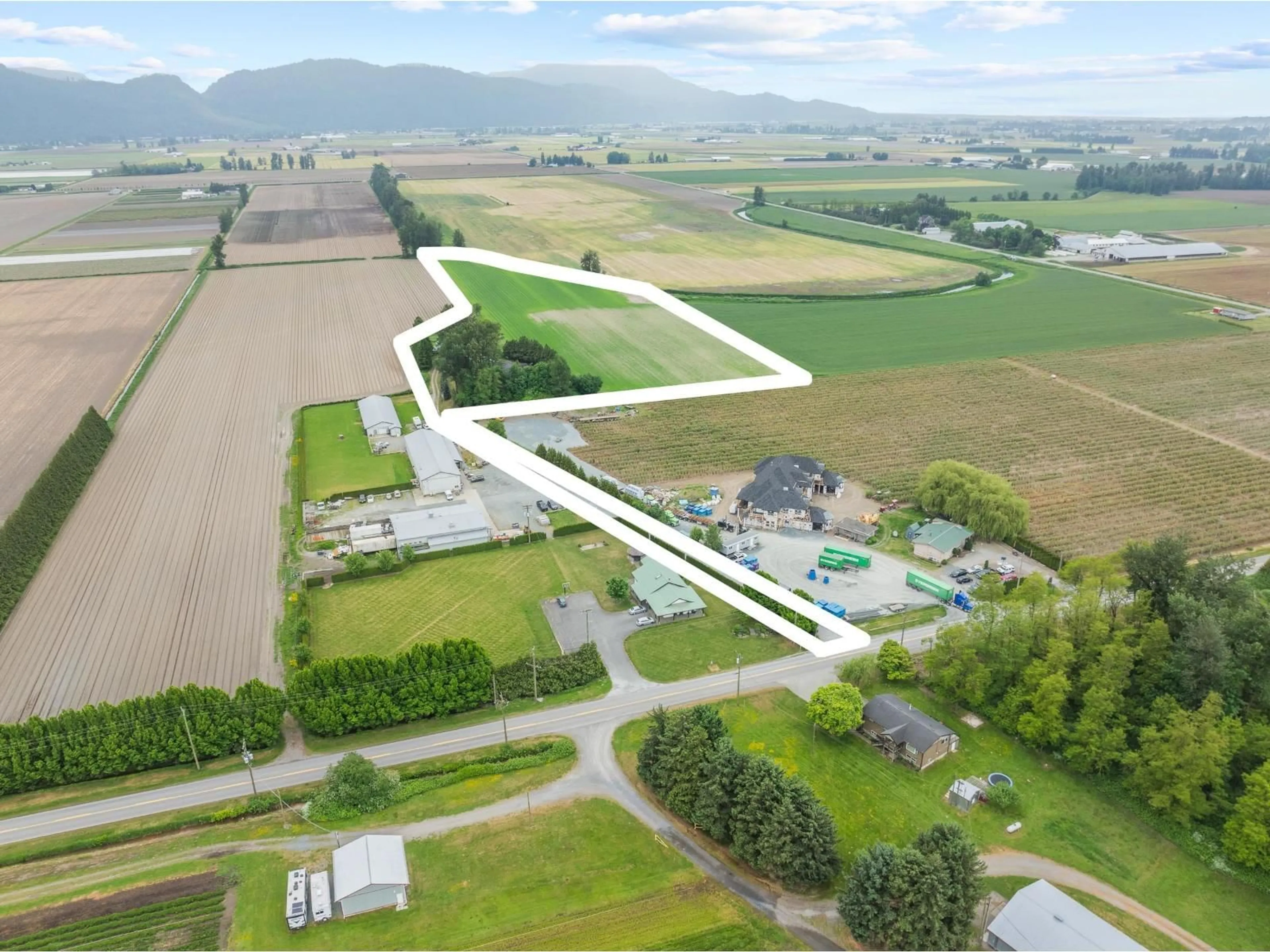 A pic from outside/outdoor area/front of a property/back of a property/a pic from drone, mountain view for 38604 NO 5 ROAD, Abbotsford British Columbia V3G2G3