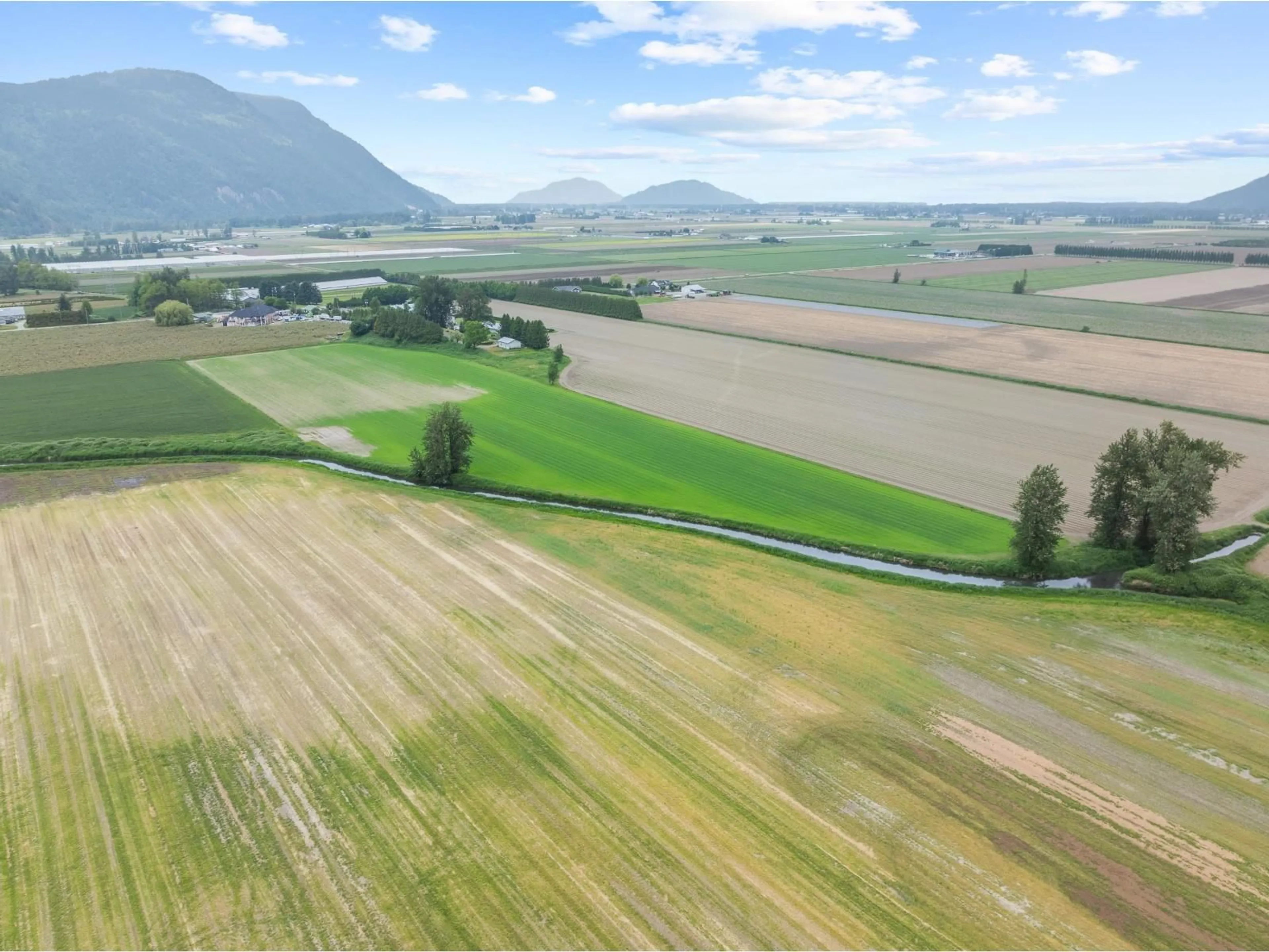 A pic from outside/outdoor area/front of a property/back of a property/a pic from drone, mountain view for 38604 NO 5 ROAD, Abbotsford British Columbia V3G2G3