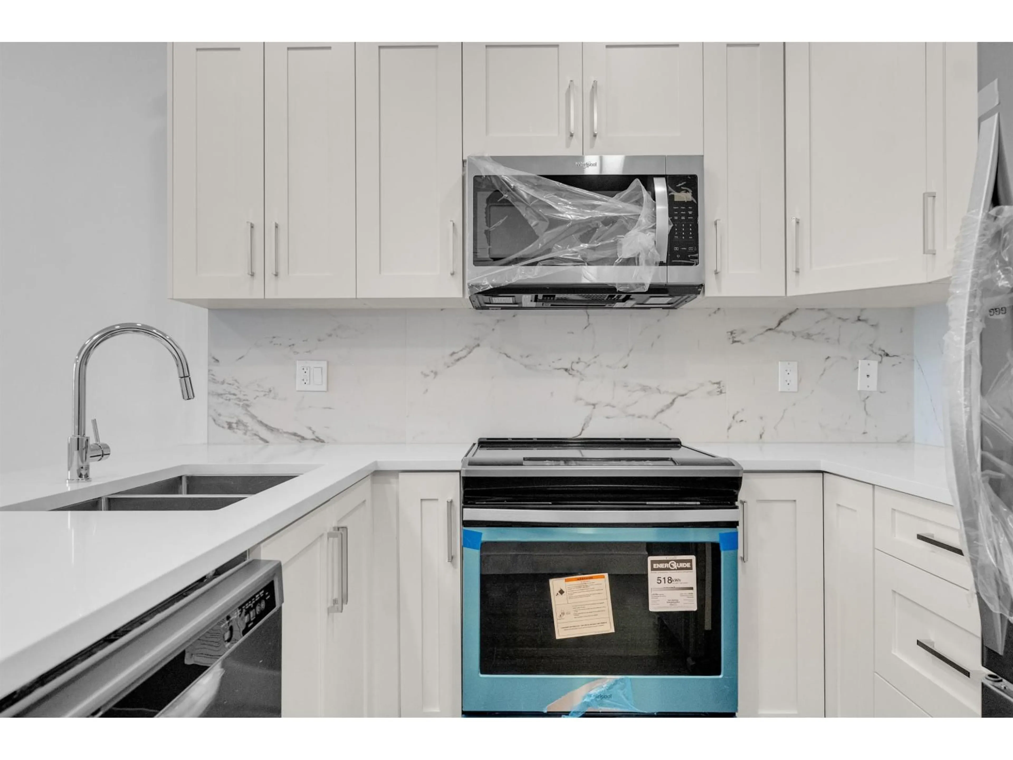 Standard kitchen, ceramic/tile floor for 103 - 9983 BARNSTON EAST, Surrey British Columbia V4N6T3