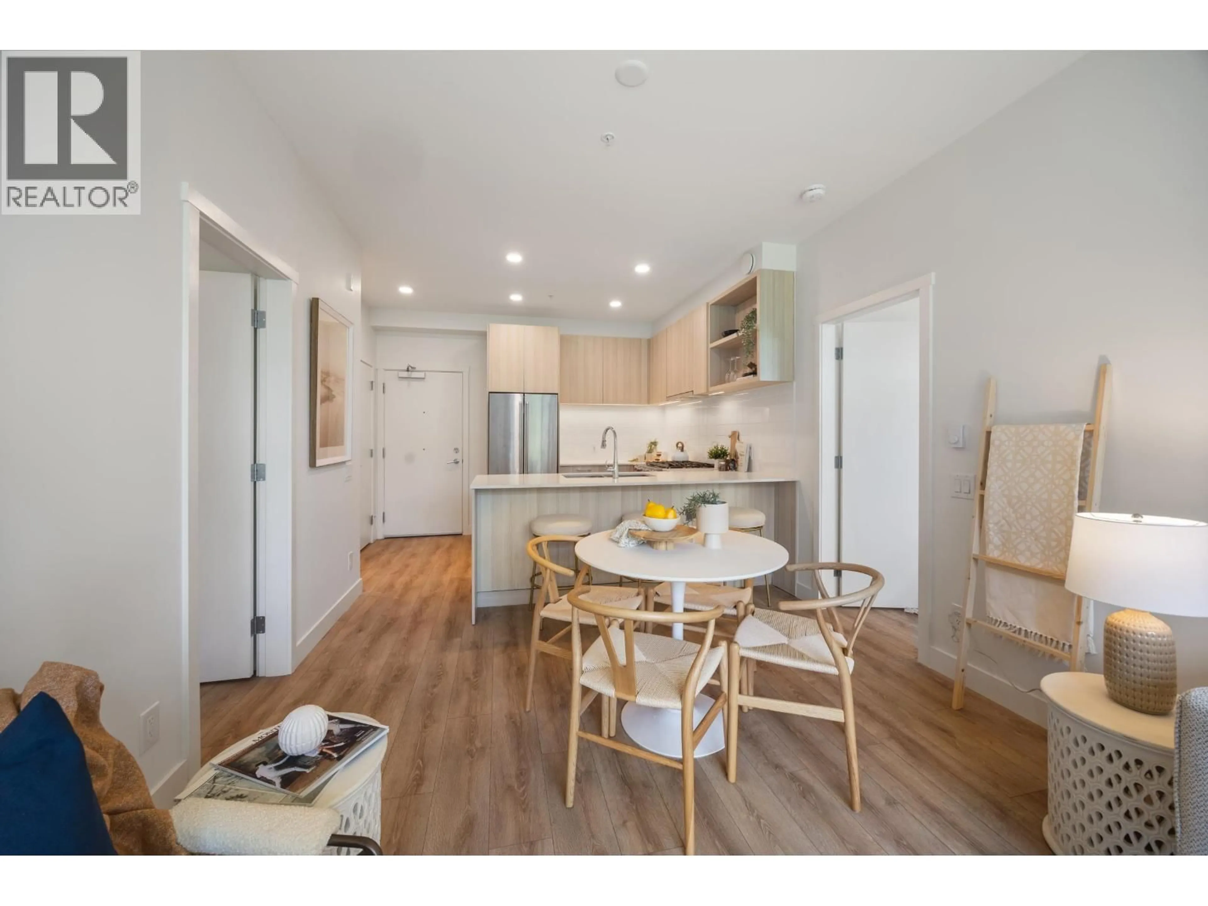 Open concept kitchen, wood/laminate floor for 222 - 735 ANSKAR COURT, Coquitlam British Columbia V3J0L7