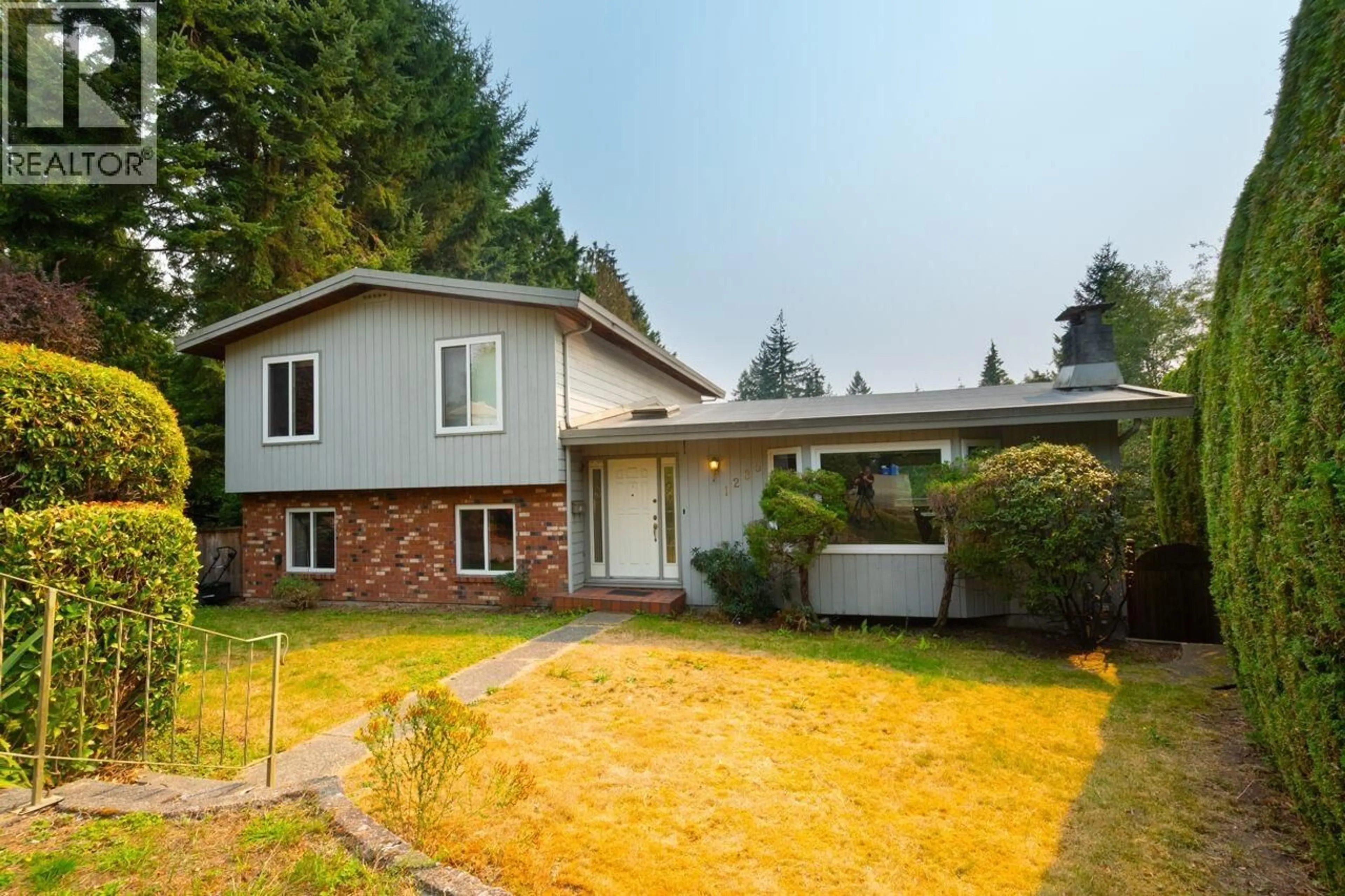 Home with vinyl exterior material, street for 1285 LUCKING PLACE, North Vancouver British Columbia V7J3L5