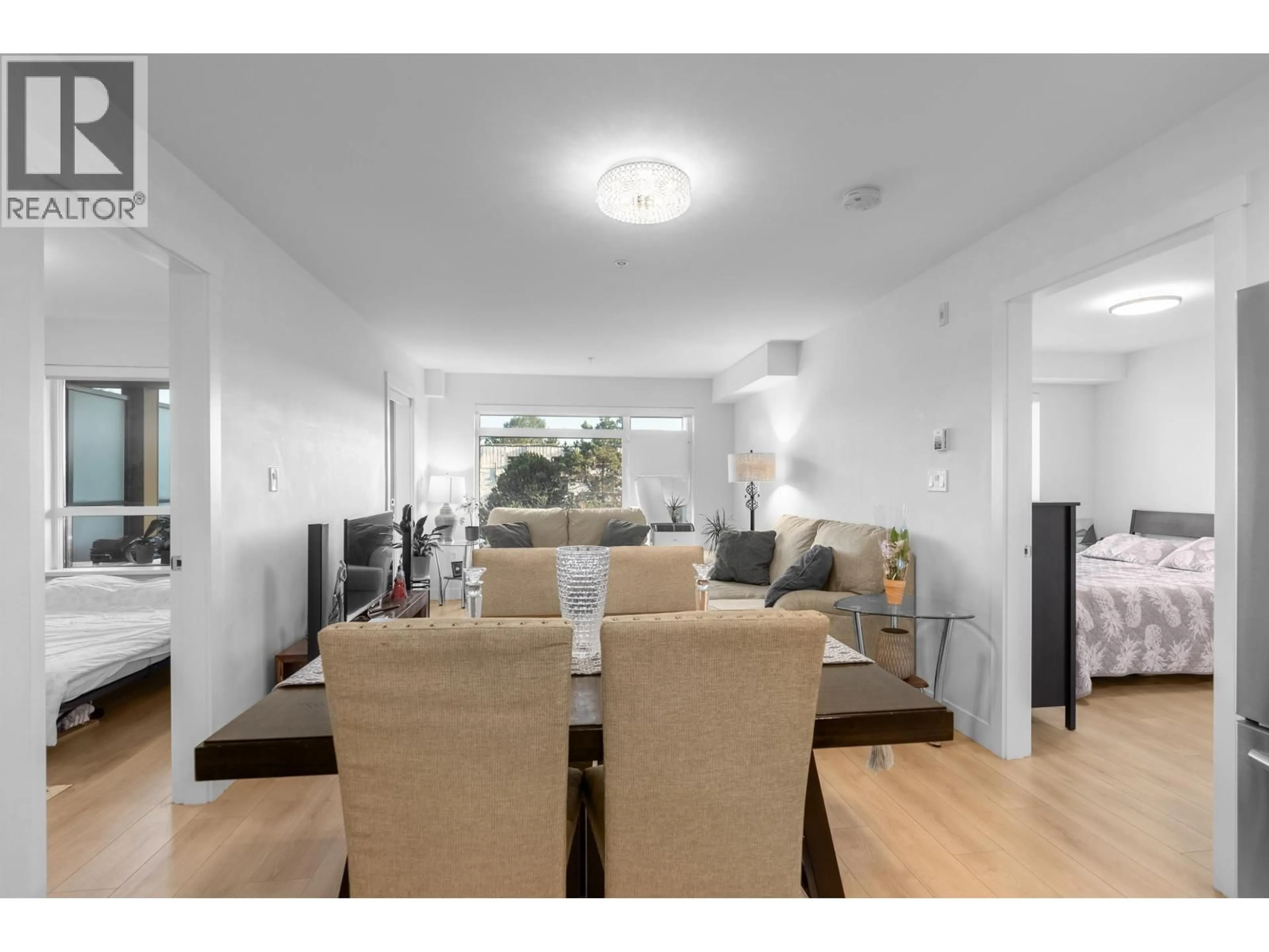 Dining room, wood/laminate floor for 406 - 1519 CROWN STREET, North Vancouver British Columbia V7J1G6