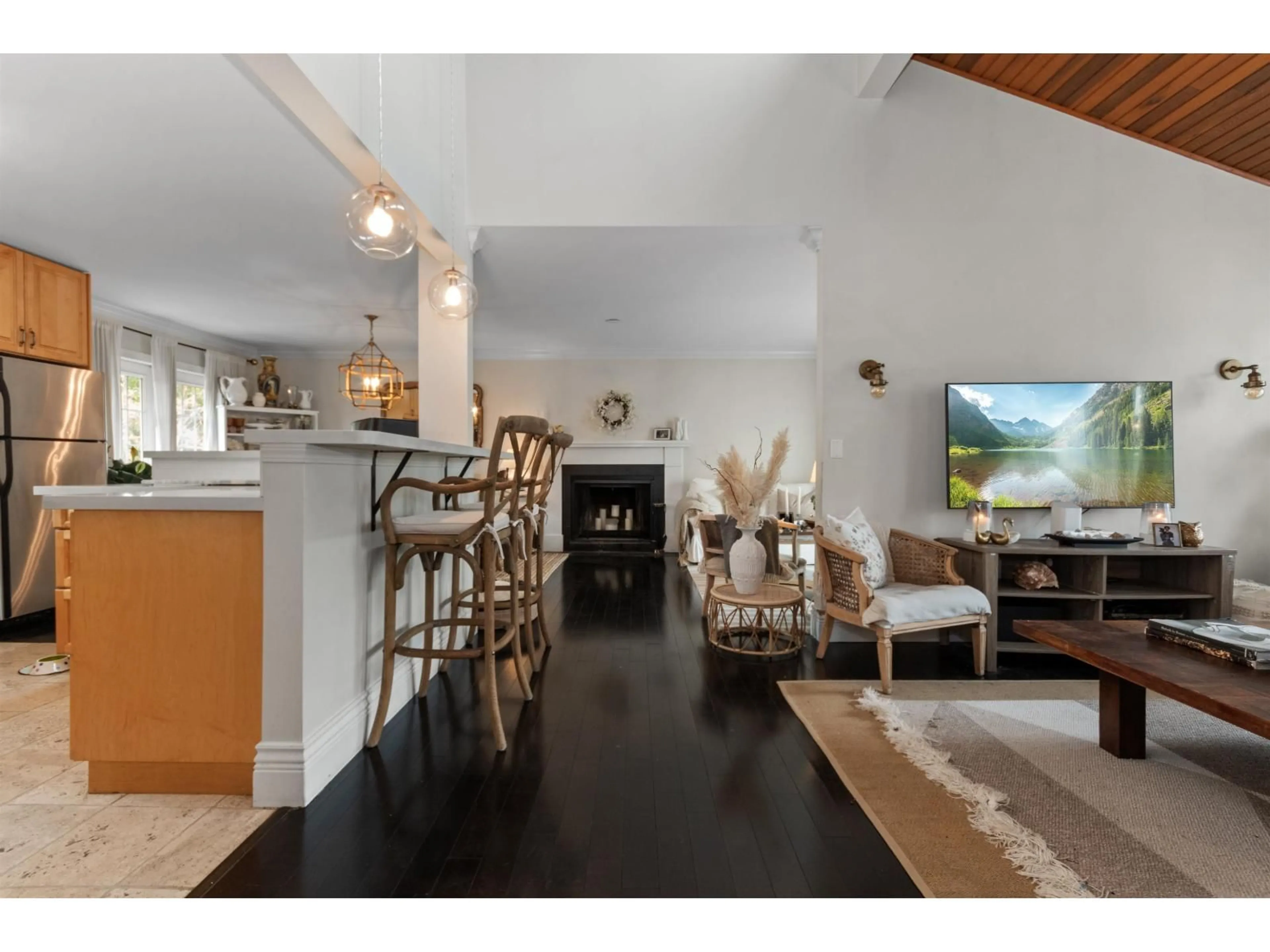 Open concept kitchen, wood/laminate floor for 19826 48A, Langley British Columbia V3A6Y2