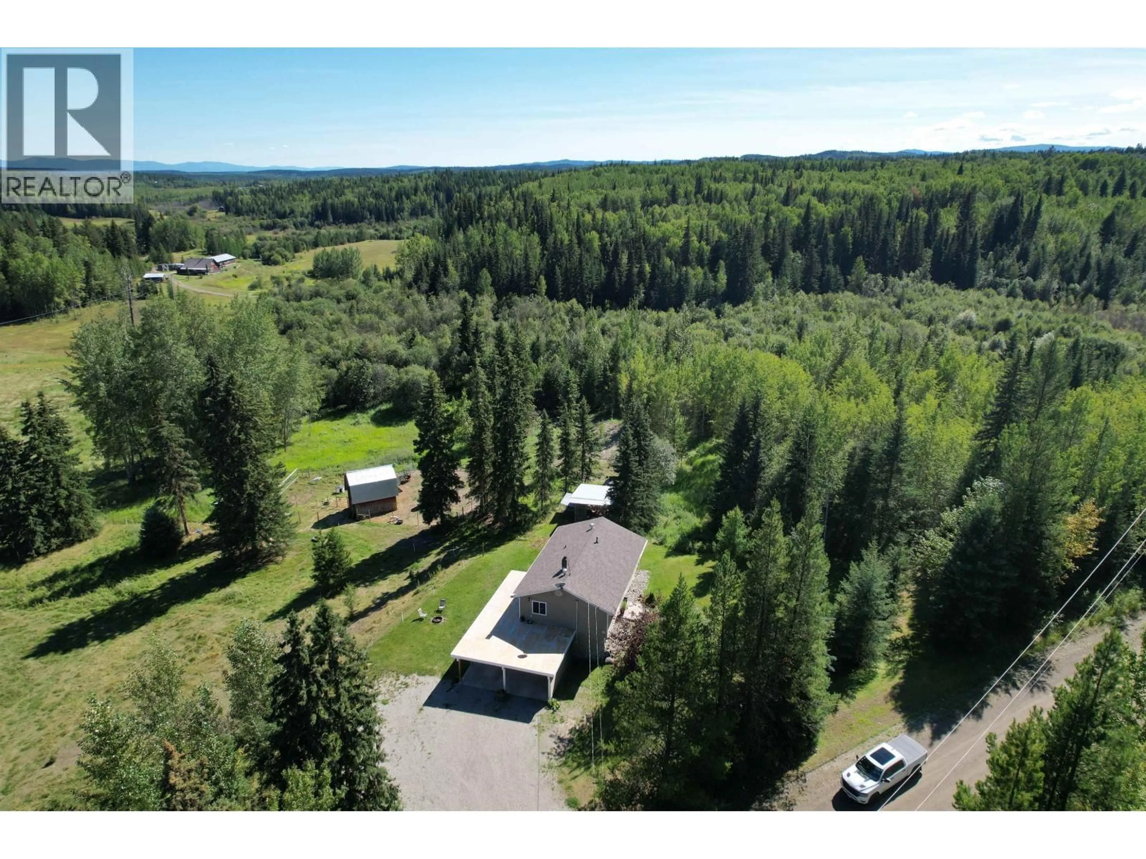 A pic from outside/outdoor area/front of a property/back of a property/a pic from drone, forest/trees view for 2873 TINDALE ROAD, Quesnel British Columbia V2J7E3