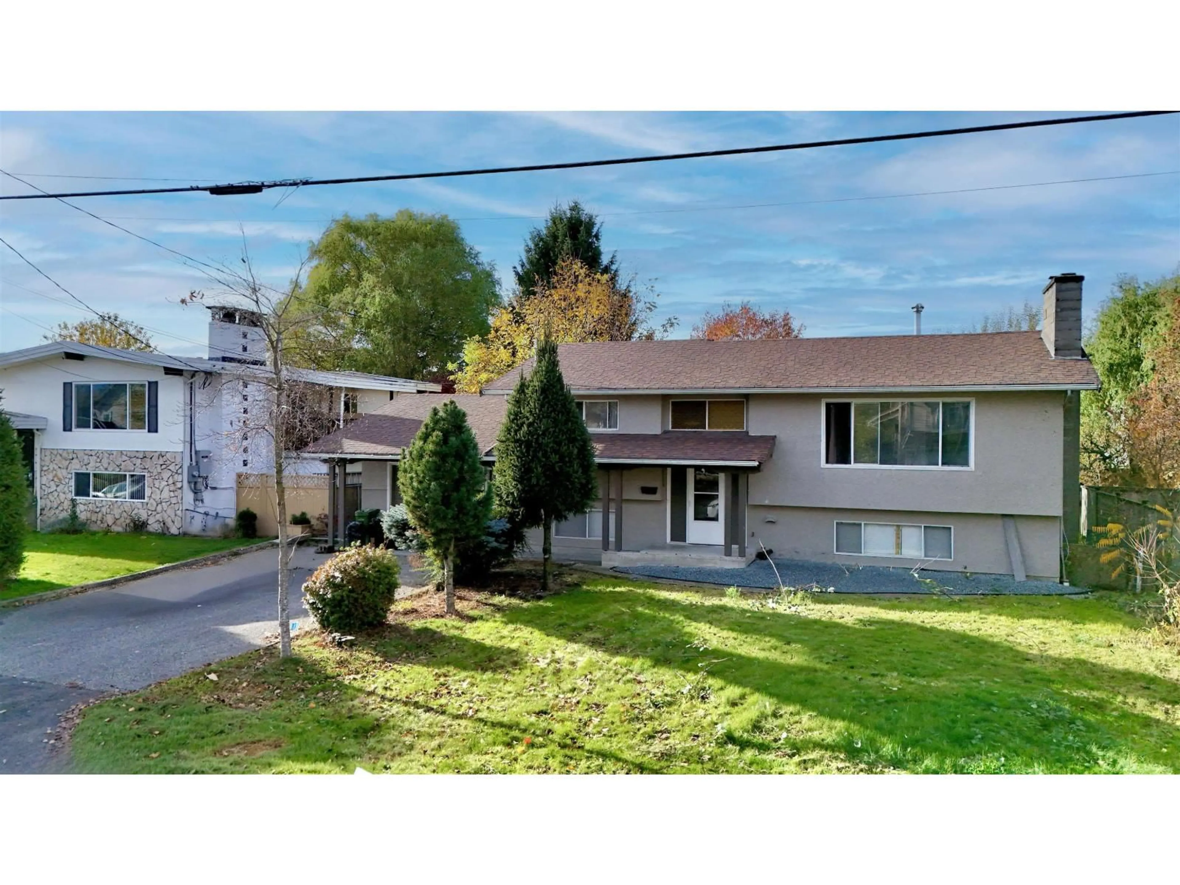 A pic from outside/outdoor area/front of a property/back of a property/a pic from drone, street for 9161 HAZEL STREET, Chilliwack British Columbia V2P5N5