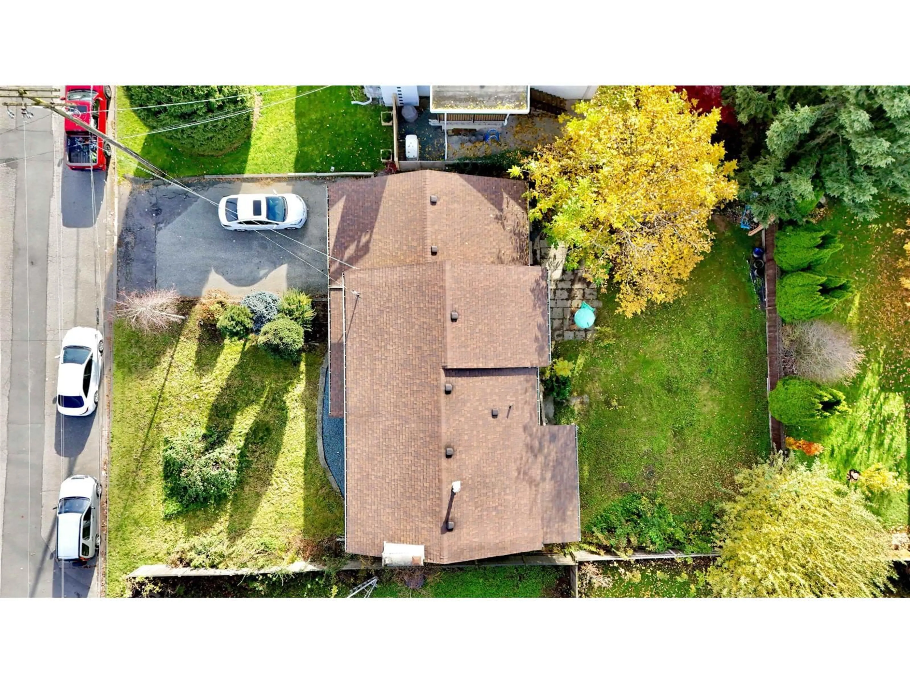 A pic from outside/outdoor area/front of a property/back of a property/a pic from drone, street for 9161 HAZEL STREET, Chilliwack British Columbia V2P5N5