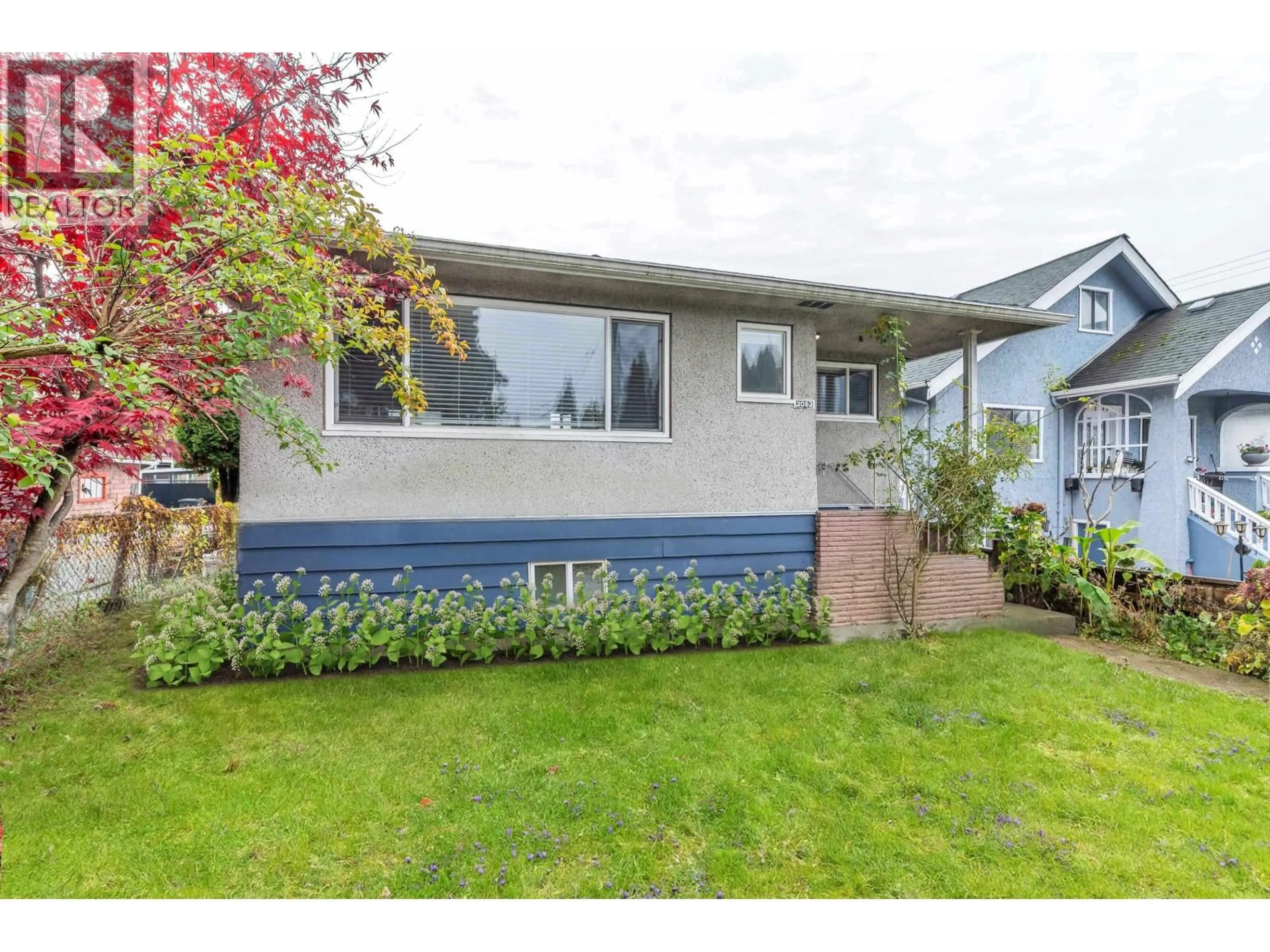 Home with vinyl exterior material, street for 2052 41ST AVENUE, Vancouver British Columbia V5P1L4