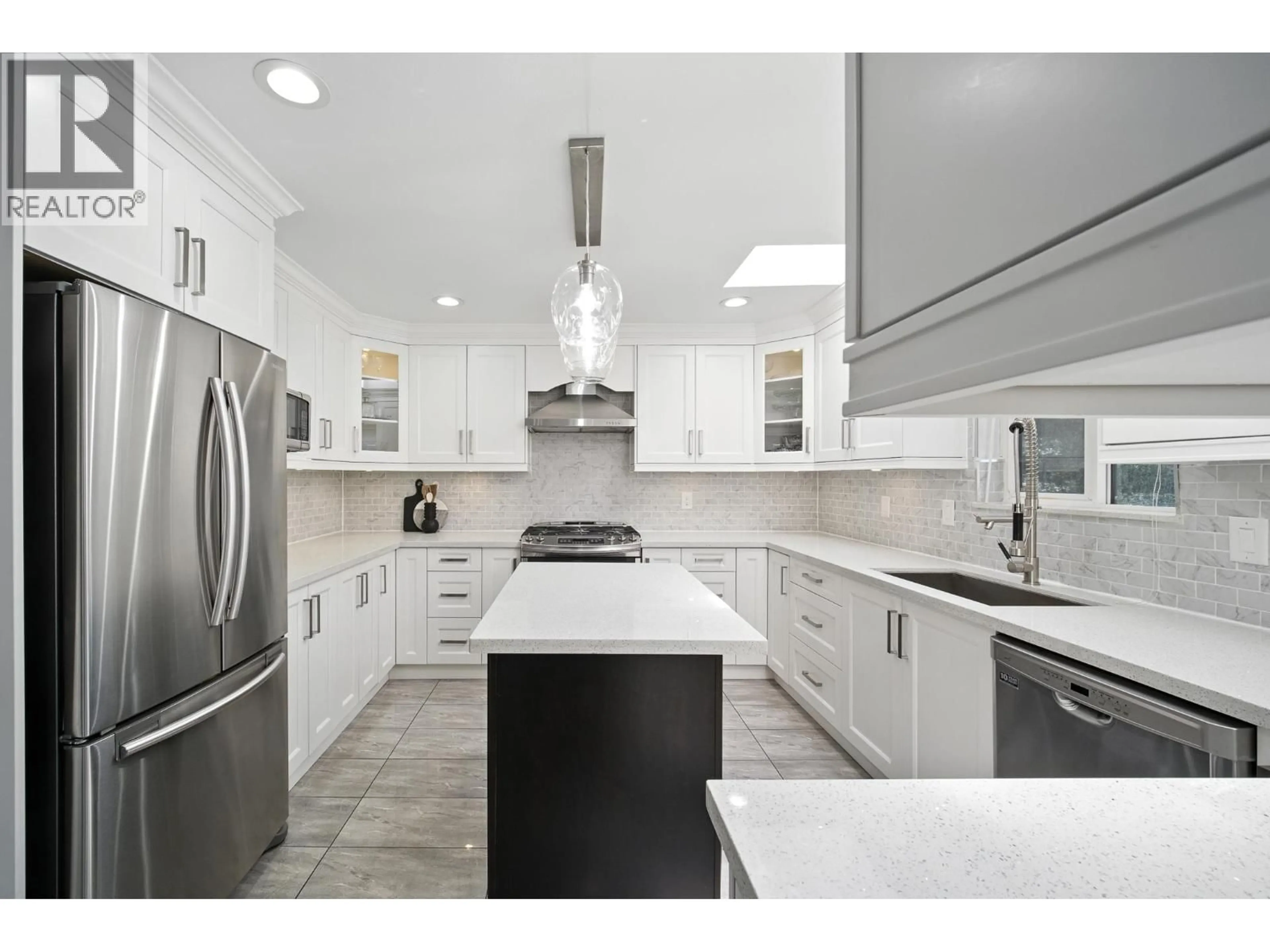 Contemporary kitchen, ceramic/tile floor for 7563 1ST STREET, Burnaby British Columbia V3N3T3