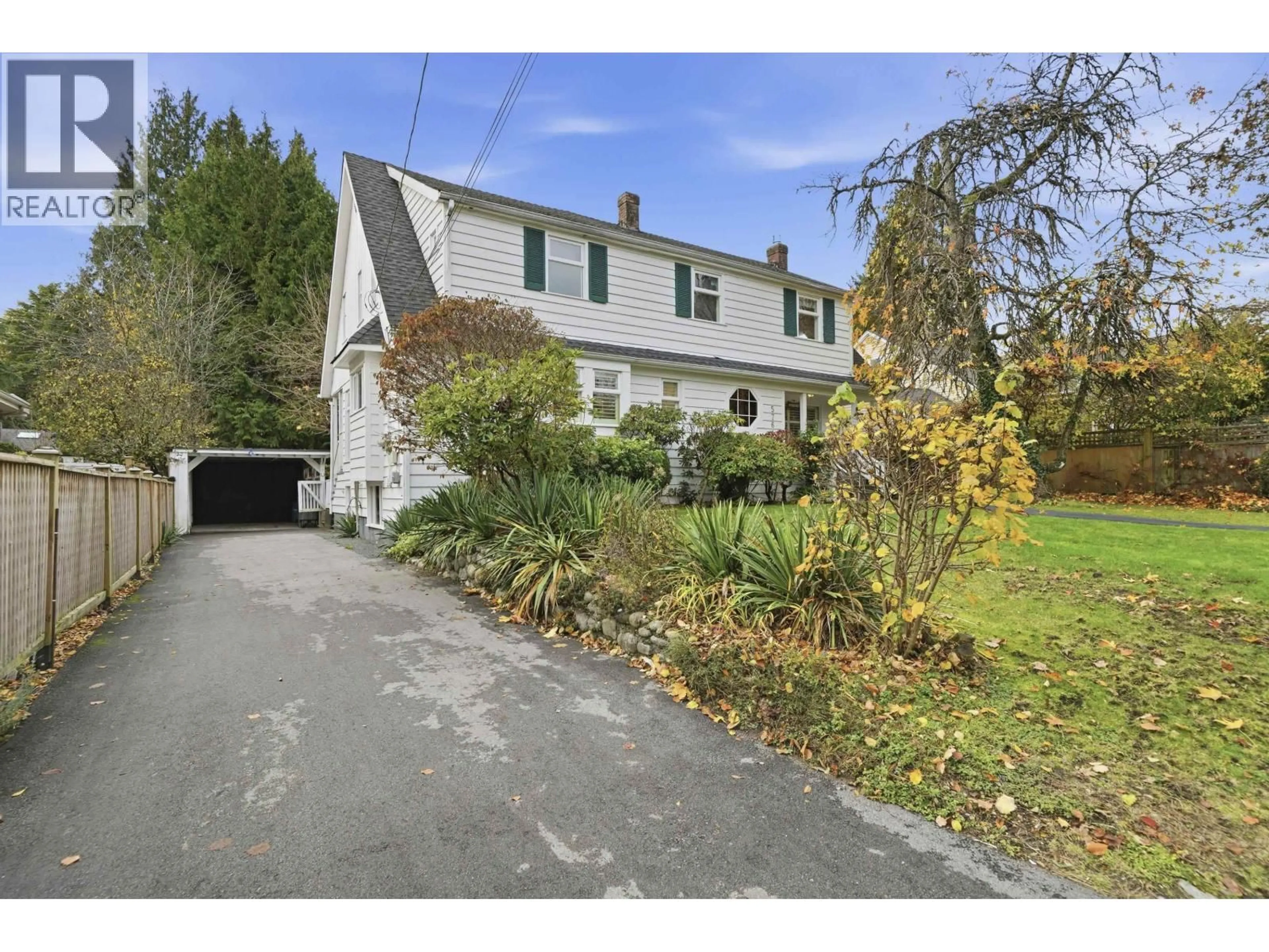 A pic from outside/outdoor area/front of a property/back of a property/a pic from drone, street for 5761 HOLLAND STREET, Vancouver British Columbia V6N2A9
