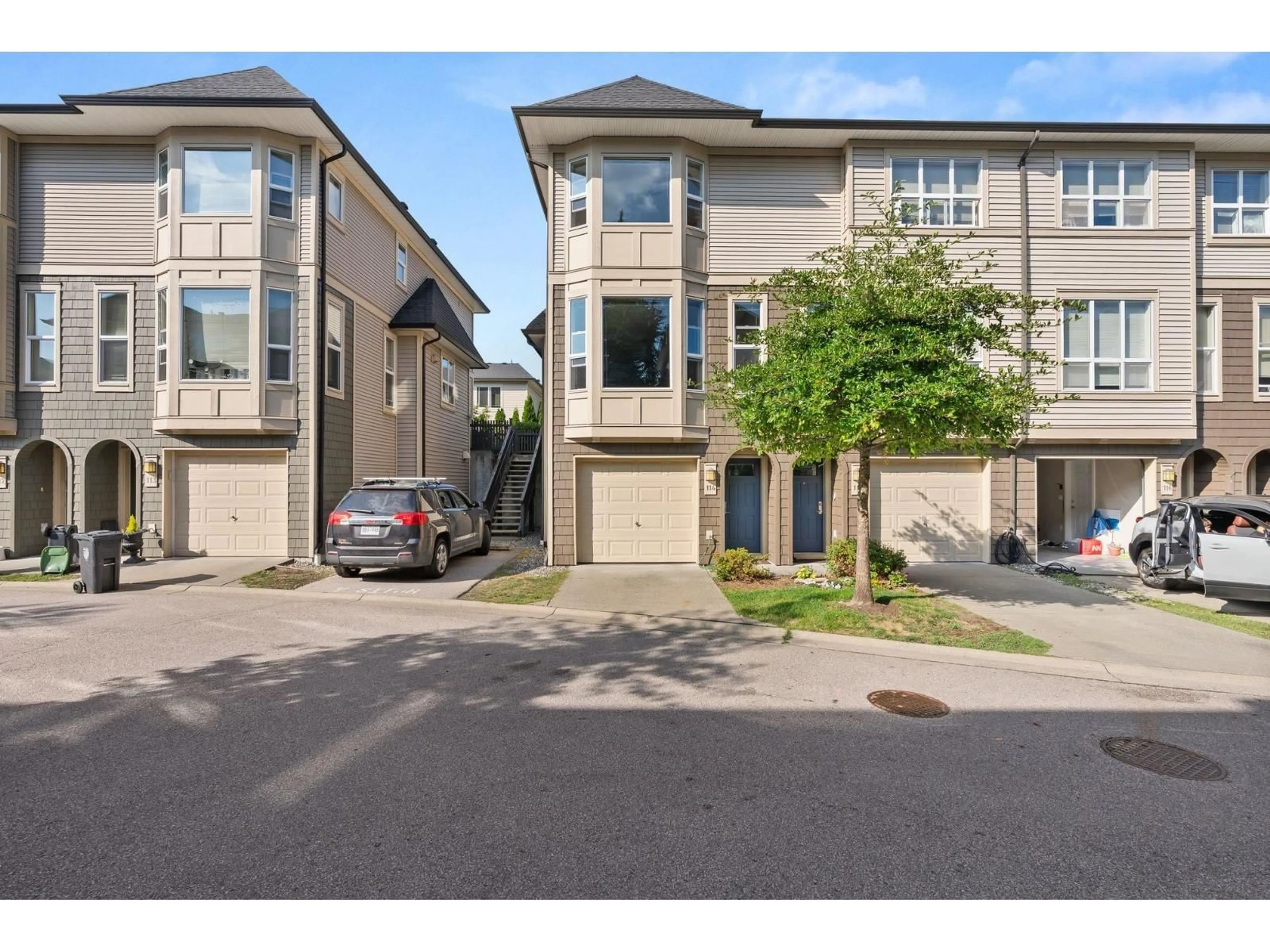 A pic from outside/outdoor area/front of a property/back of a property/a pic from drone, street for 114 - 7938 209 STREET, Langley British Columbia V2Y0J7