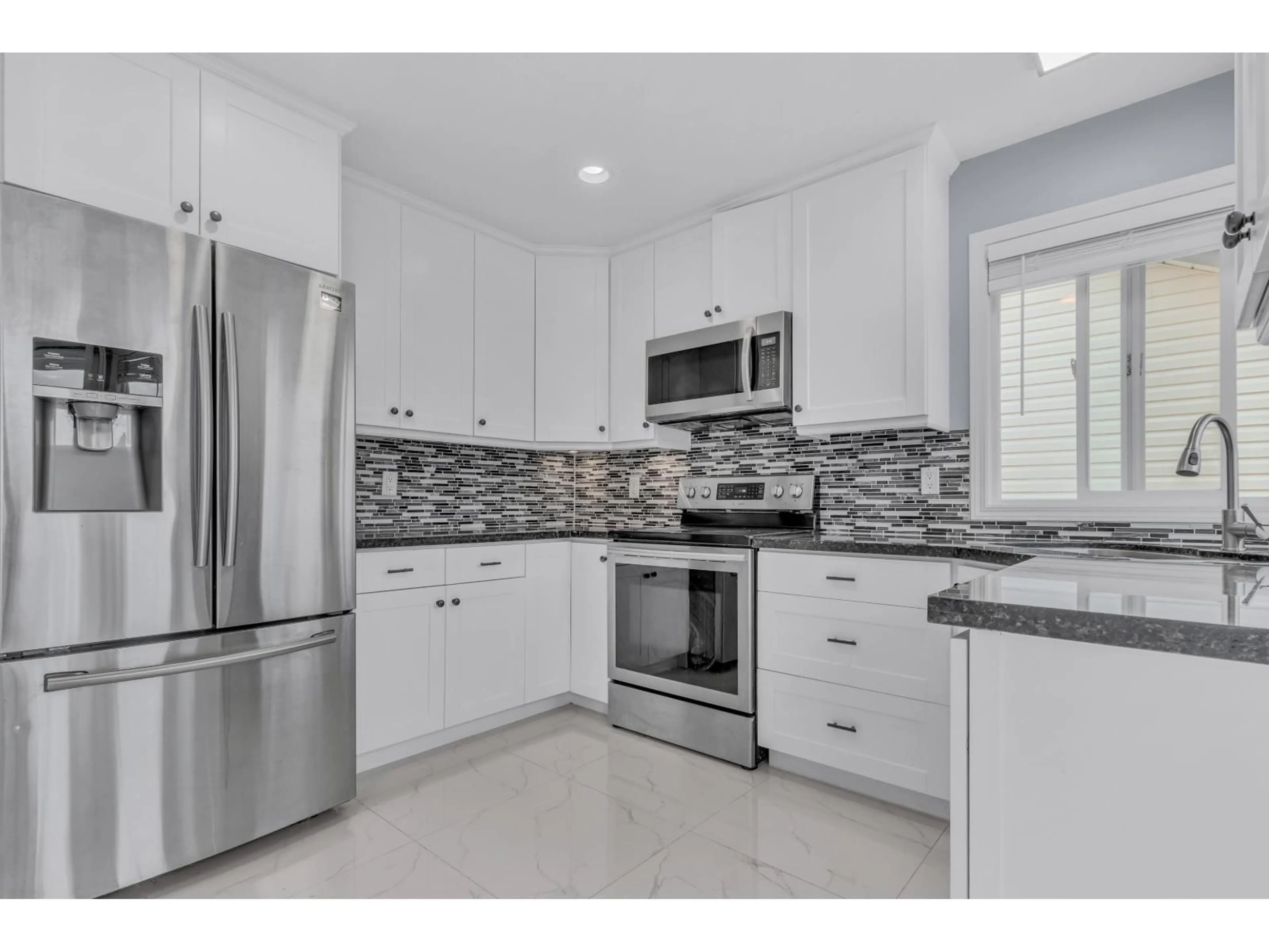 Open concept kitchen, ceramic/tile floor for 5664 VILLA ROSA PLACE, Chilliwack British Columbia V2R3K6