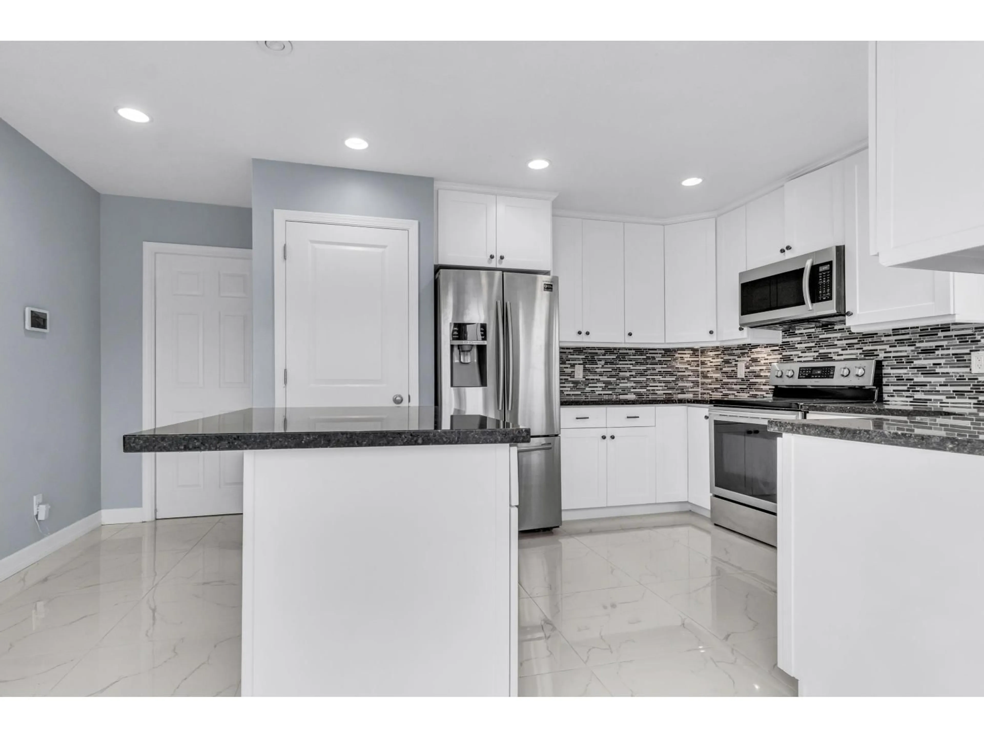 Open concept kitchen, ceramic/tile floor for 5664 VILLA ROSA PLACE, Chilliwack British Columbia V2R3K6