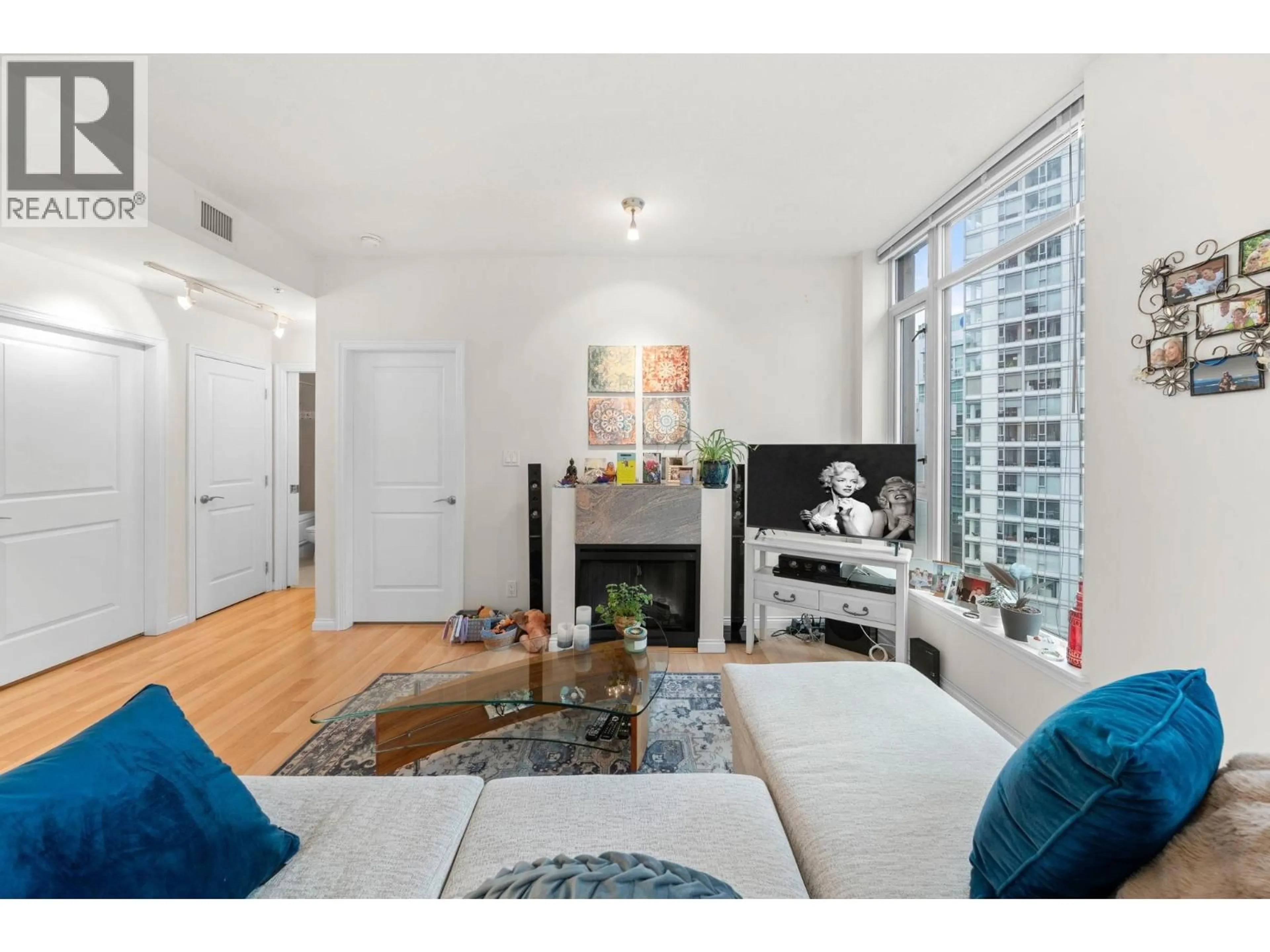 Living room with furniture, unknown for 1101 - 1211 MELVILLE STREET, Vancouver British Columbia V6E0A7