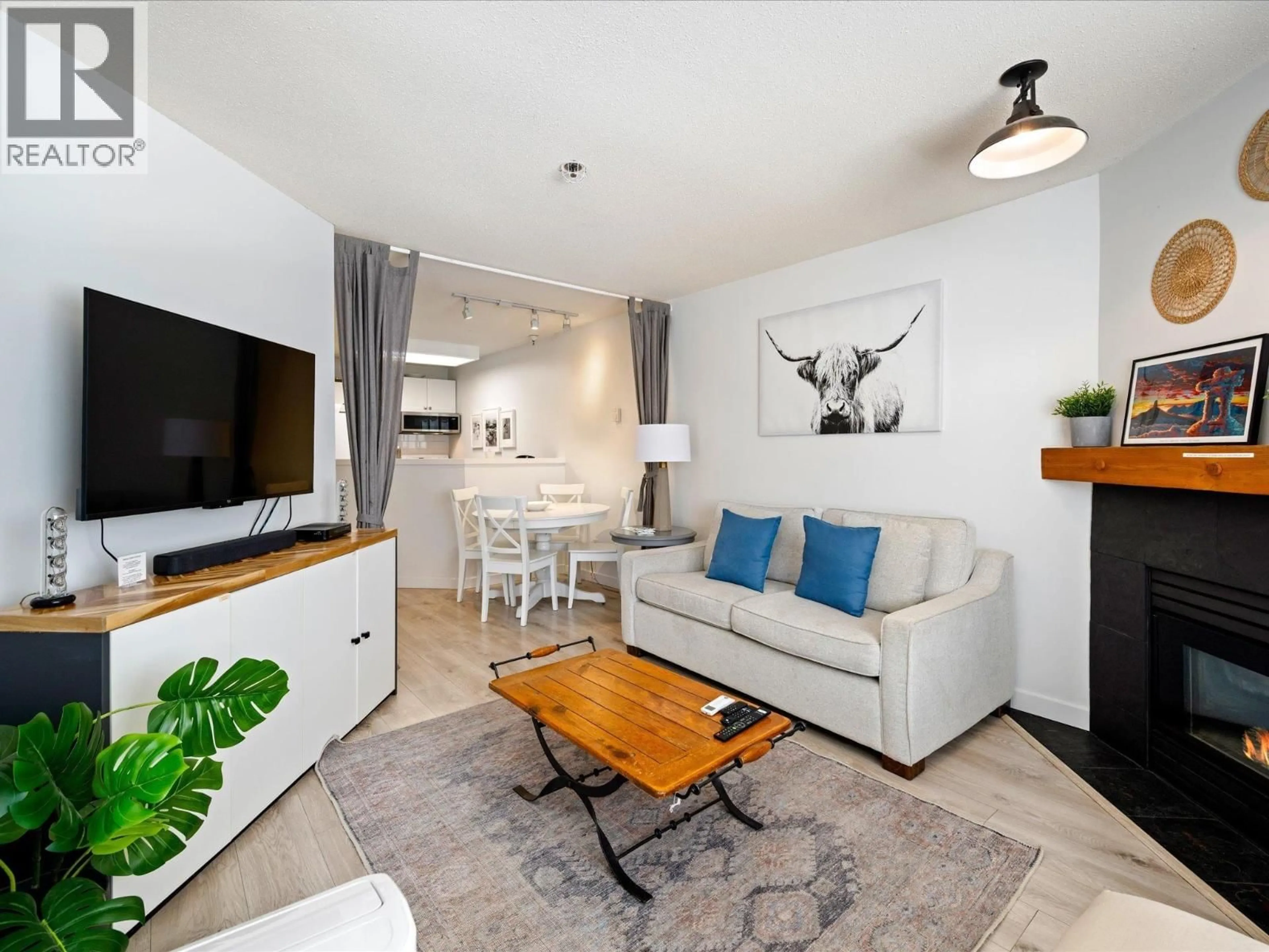 Living room with furniture, wood/laminate floor for 253 - 4340 LORIMER ROAD, Whistler British Columbia V8E1A5