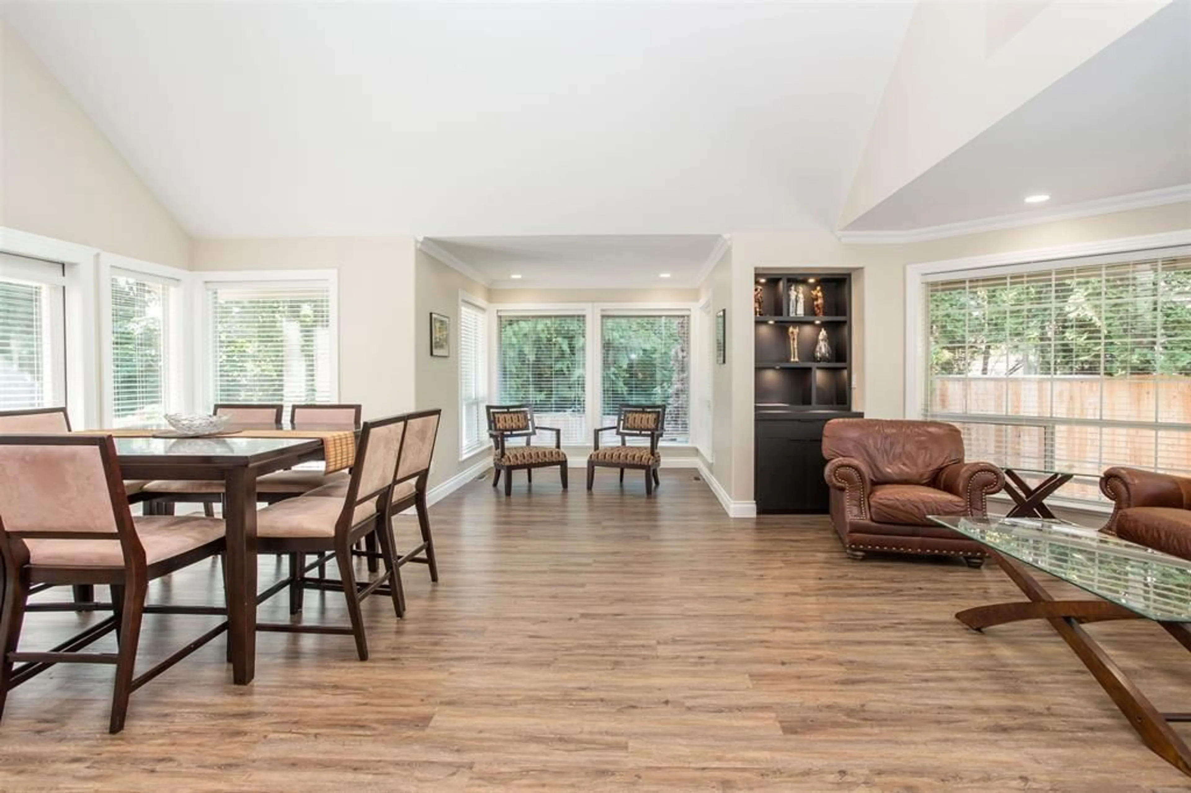 Living room with furniture, wood/laminate floor for 4457 196, Surrey British Columbia V3Z0L7