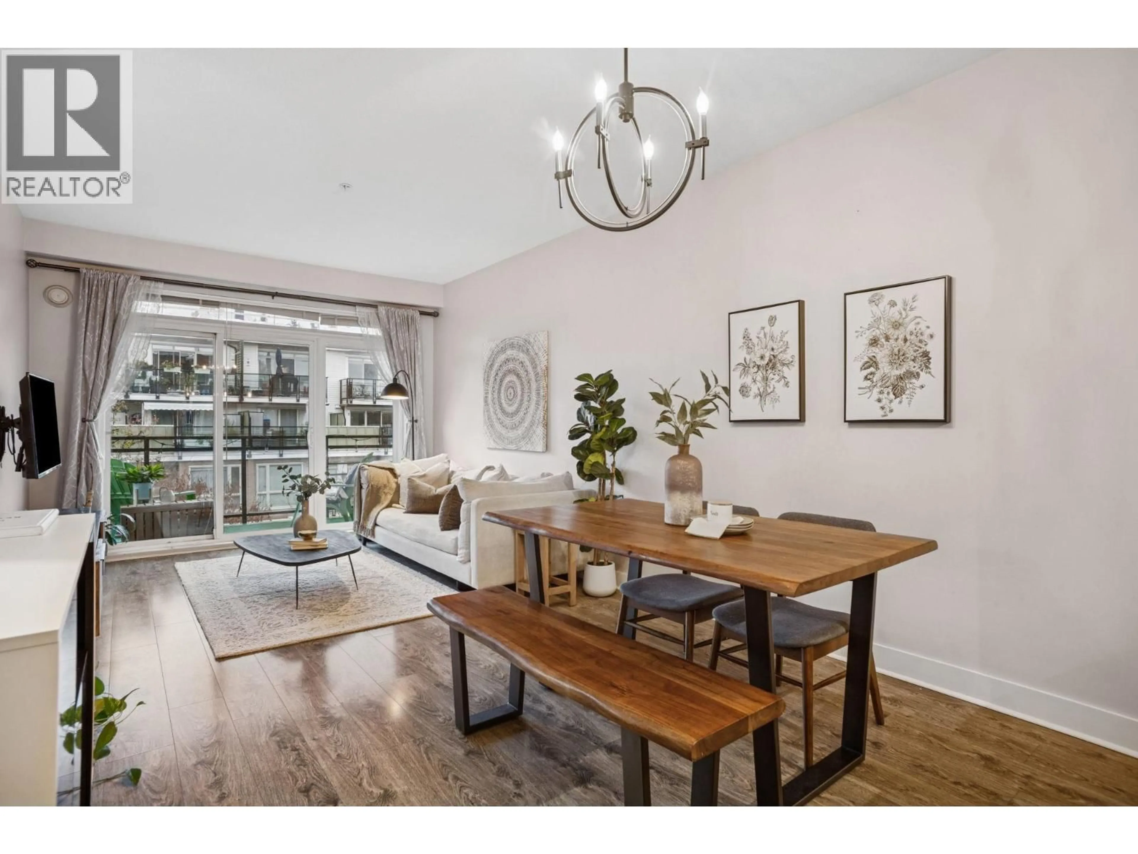 Dining room, wood/laminate floor for 303 - 733 14 STREET, North Vancouver British Columbia V7M0C6