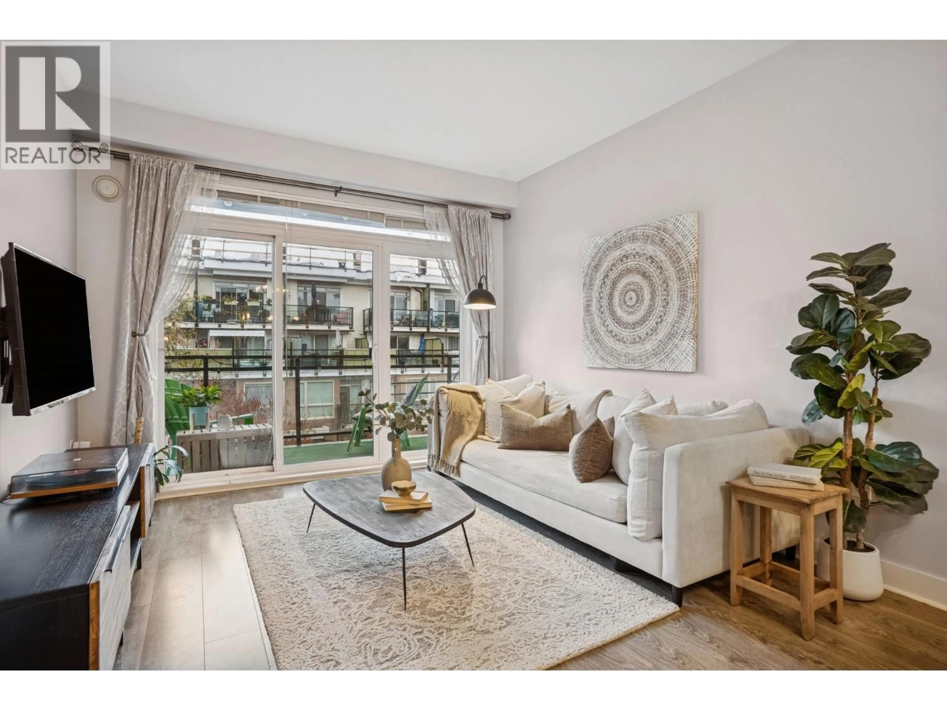 Living room with furniture, unknown for 303 - 733 14 STREET, North Vancouver British Columbia V7M0C6