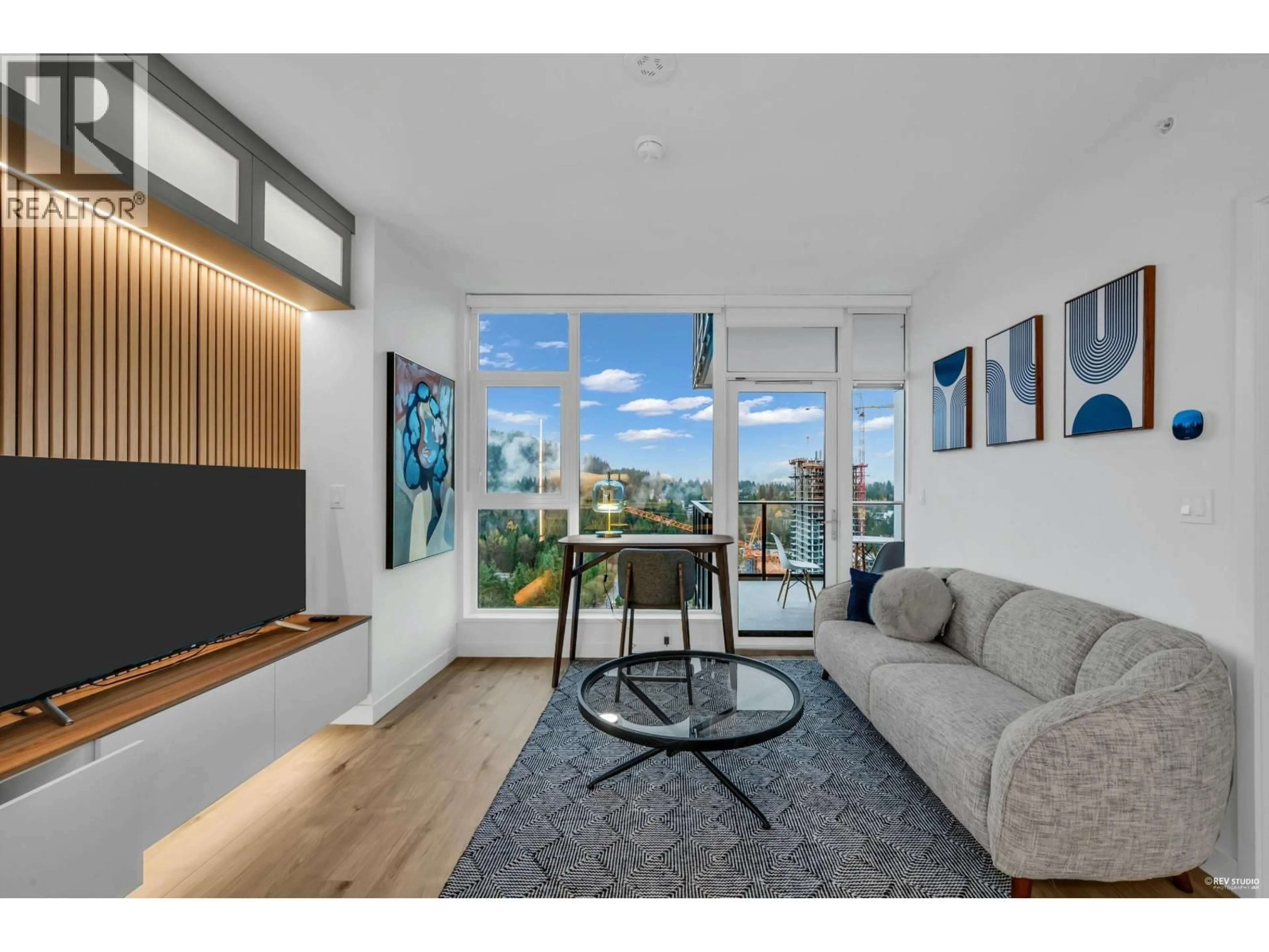 Living room with furniture, wood/laminate floor for 1601 - 720 FARROW STREET, Coquitlam British Columbia V3J0P3