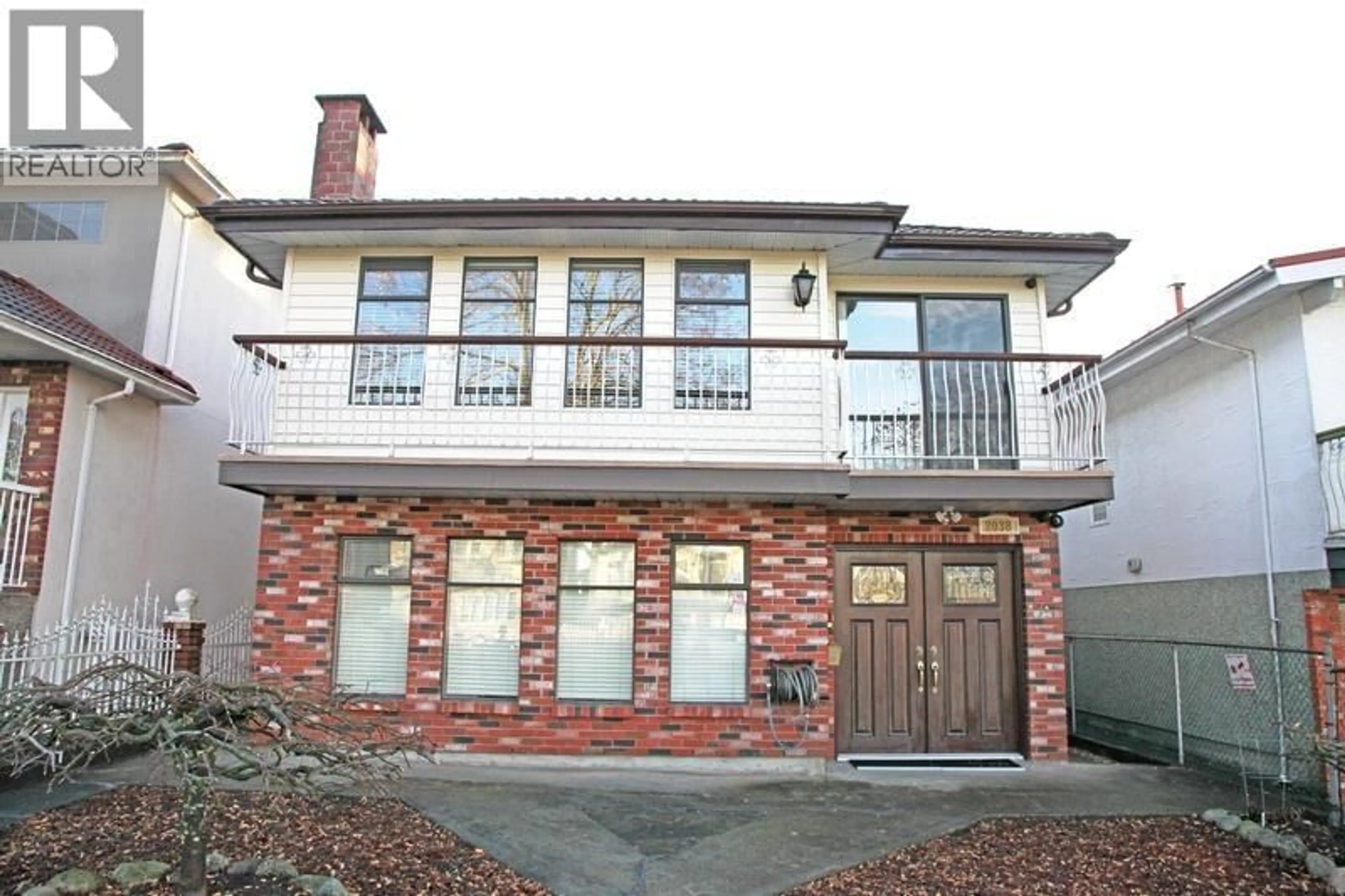 Home with brick exterior material, building for 2038 40TH AVENUE, Vancouver British Columbia V5P1J3