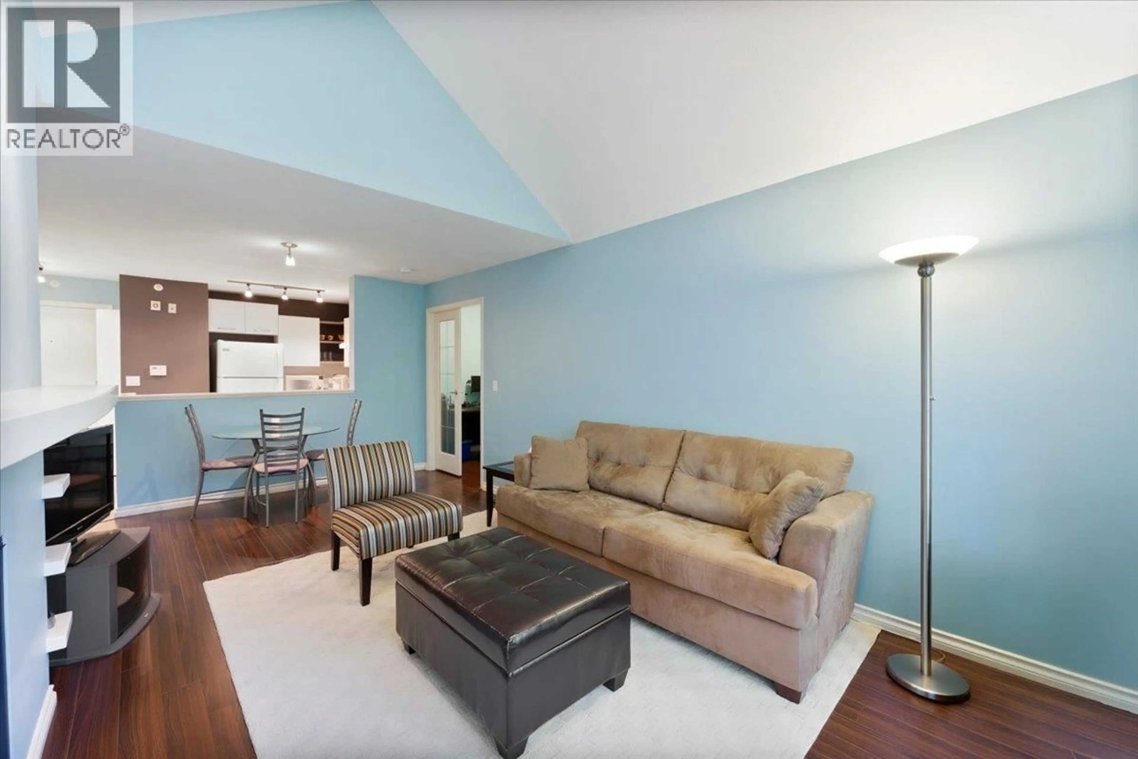 Living room with furniture, wood/laminate floor for 413 - 6893 PRENTER STREET, Burnaby British Columbia V5E4L3