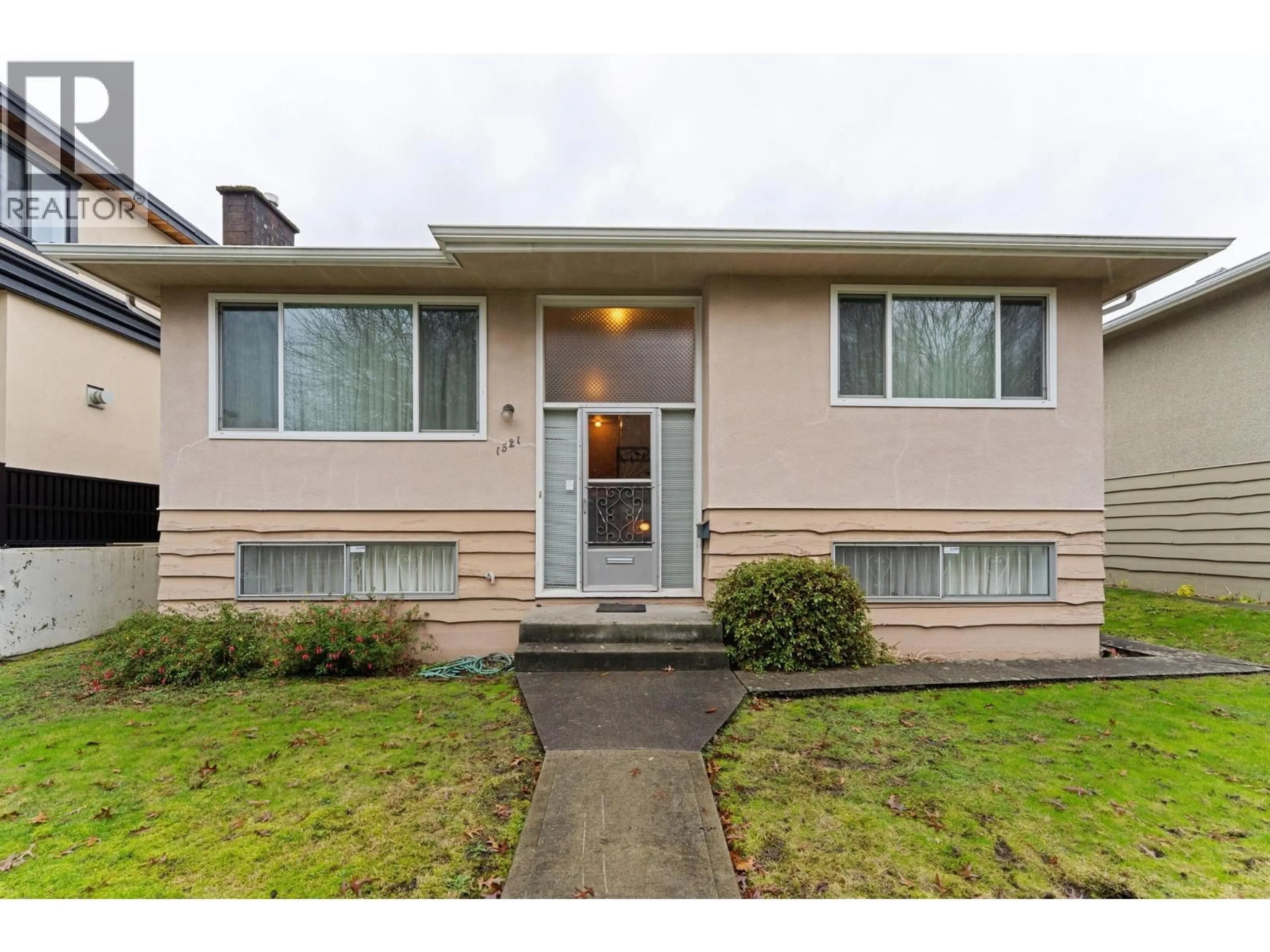Home with vinyl exterior material, street for 1521 64TH AVENUE, Vancouver British Columbia V5P2M4