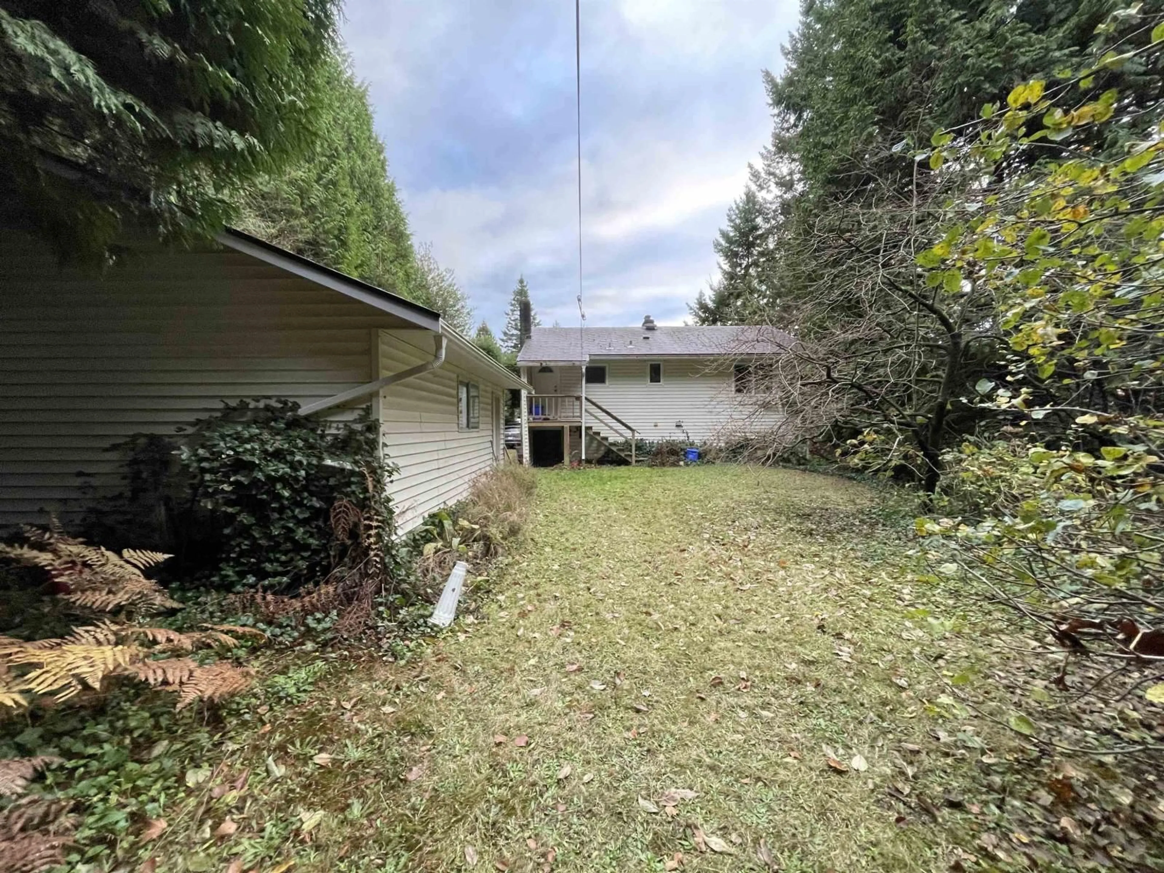 A pic from outside/outdoor area/front of a property/back of a property/a pic from drone, unknown for 12665 22, Surrey British Columbia V4A2B9