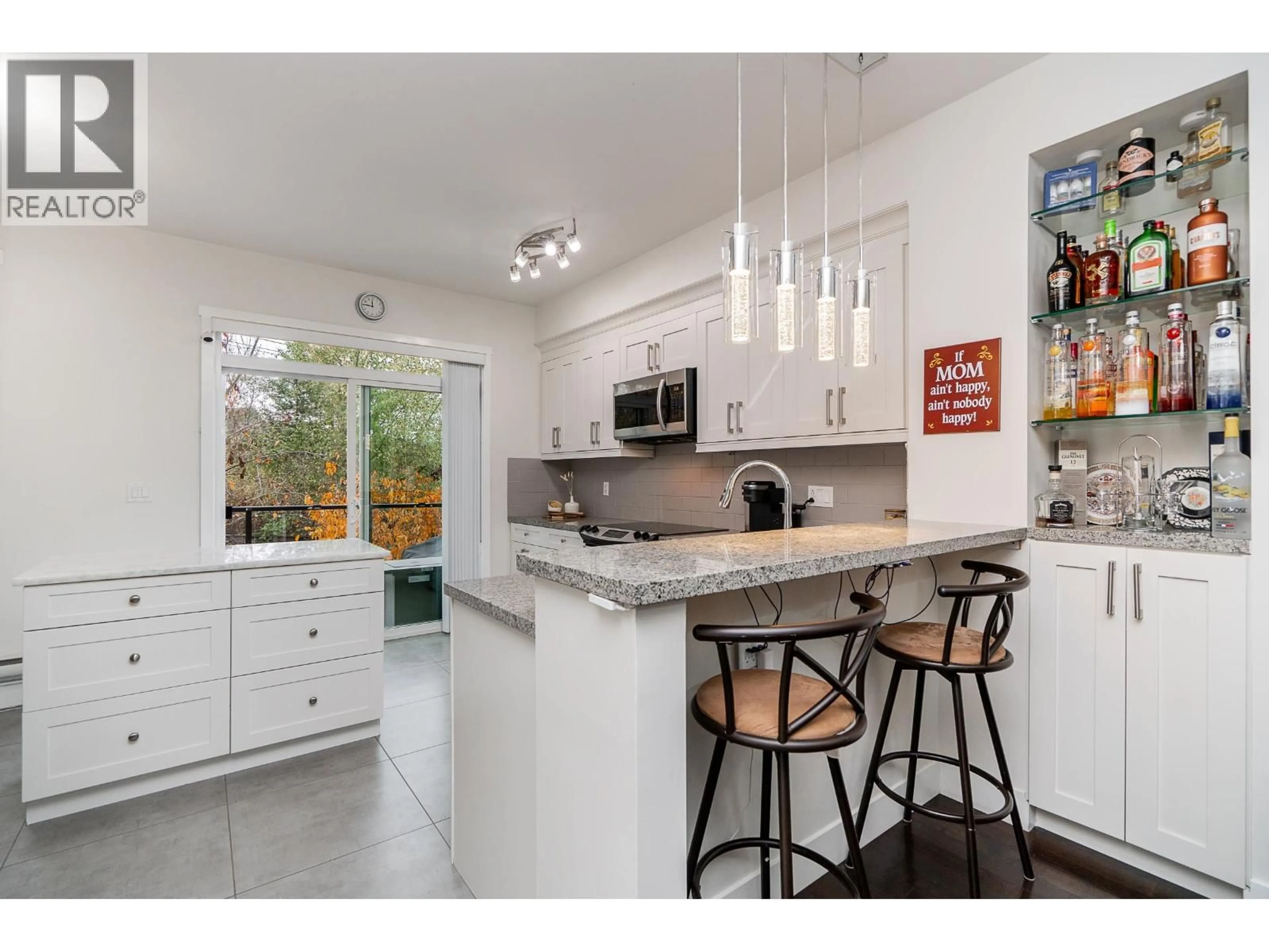 Open concept kitchen, ceramic/tile floor for 21 - 1299 COAST MERIDIAN ROAD, Coquitlam British Columbia V3E0H6