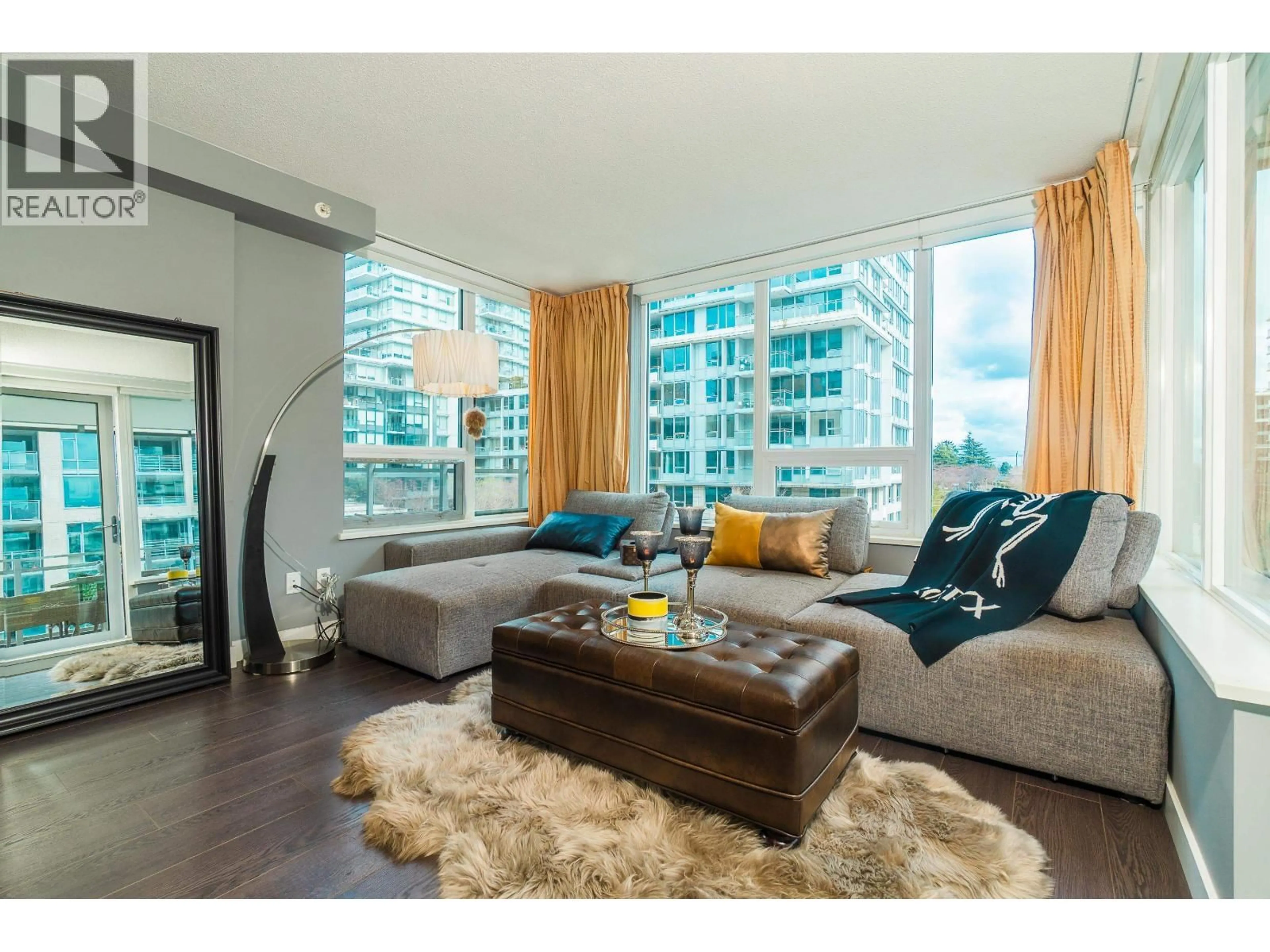 Living room with furniture, wood/laminate floor for 601 - 8833 HAZELBRIDGE WAY, Richmond British Columbia V6X0N3