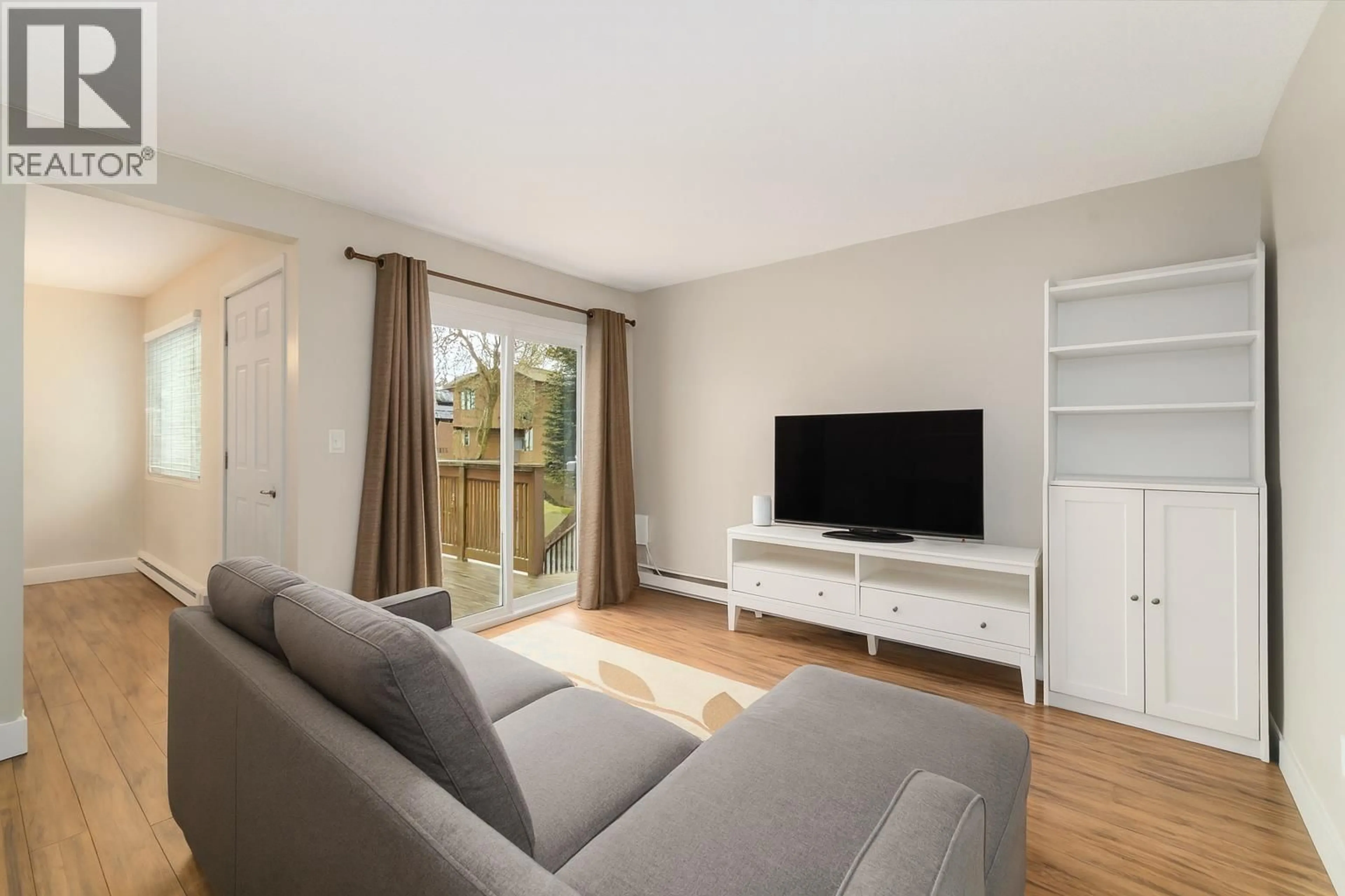 Living room with furniture, wood/laminate floor for 5 - 314 HIGHLAND WAY, Port Moody British Columbia V3H3V7