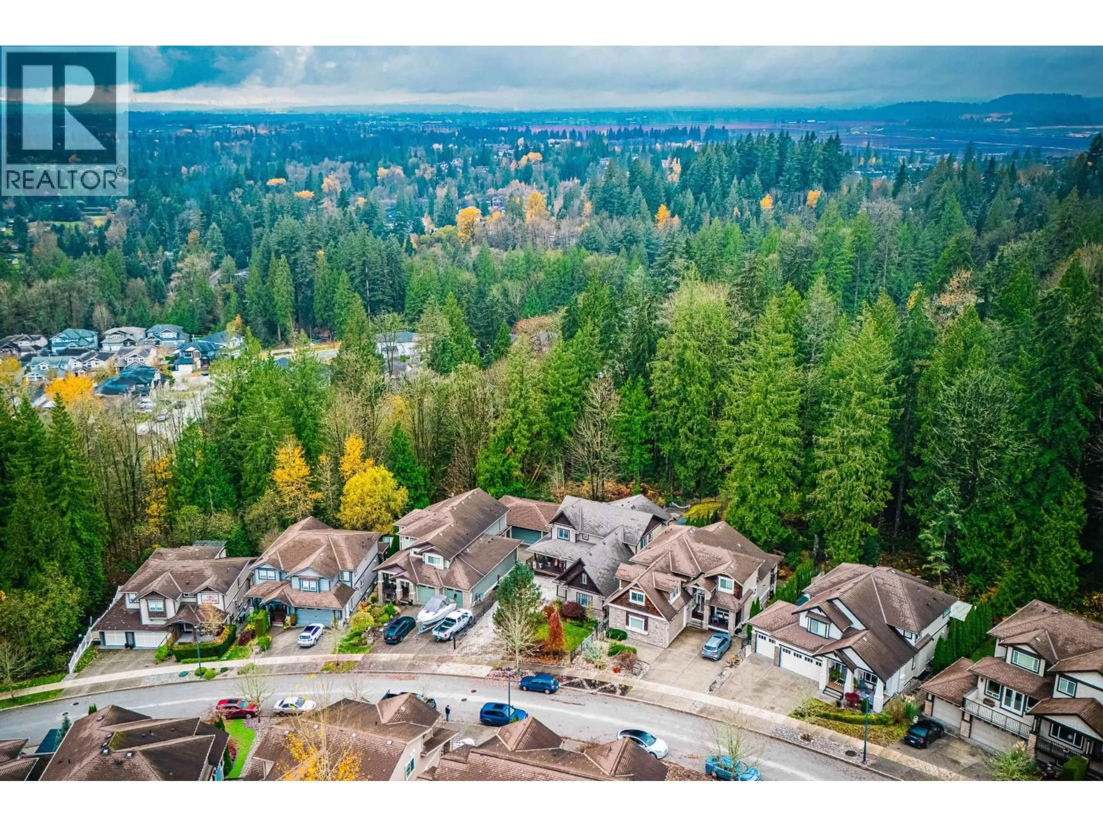 A pic from outside/outdoor area/front of a property/back of a property/a pic from drone, mountain view for 13439 235 STREET, Maple Ridge British Columbia V4R2W3