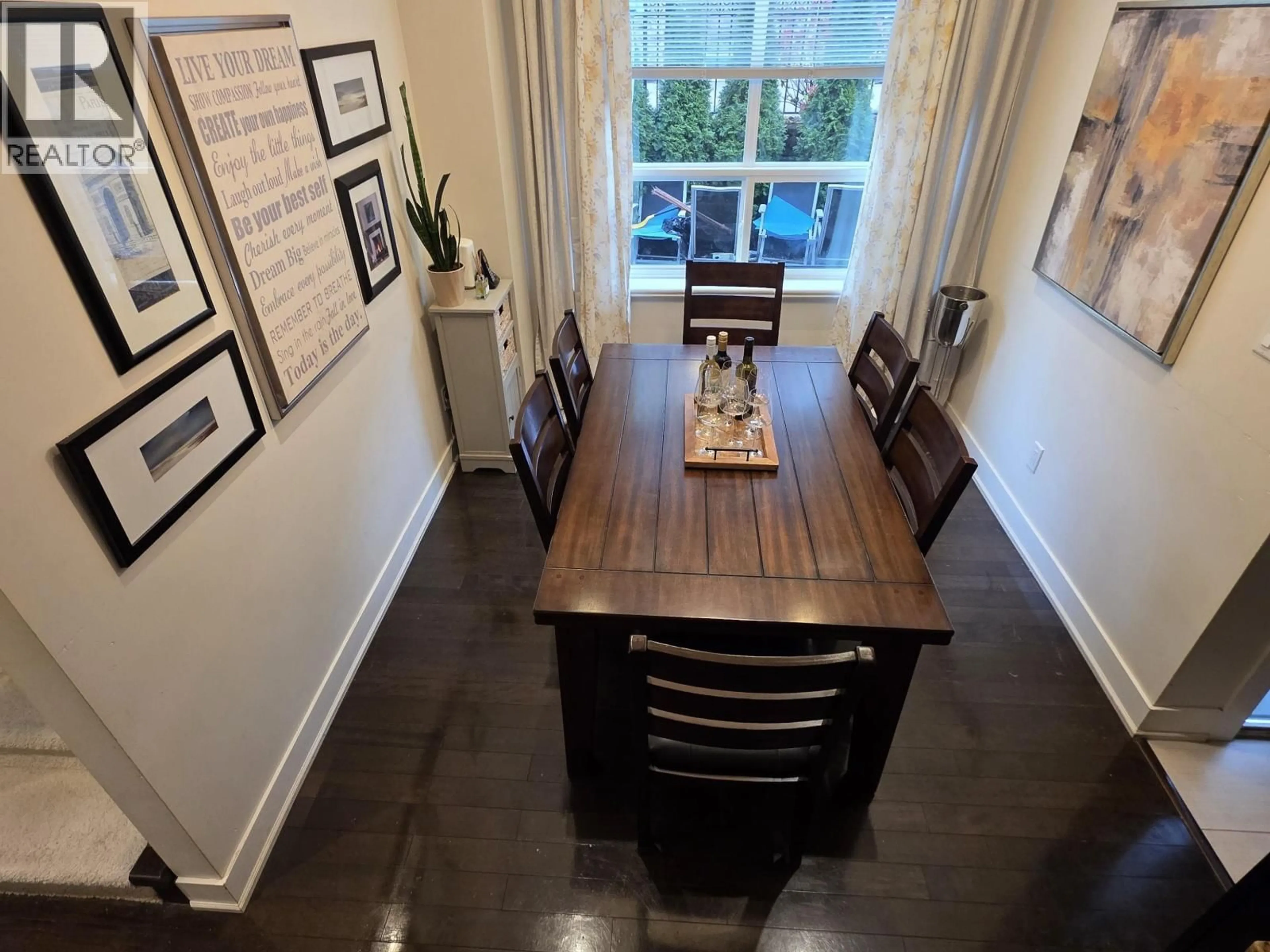 Dining room, wood/laminate floor for 665 15TH STREET, North Vancouver British Columbia V7M1T1