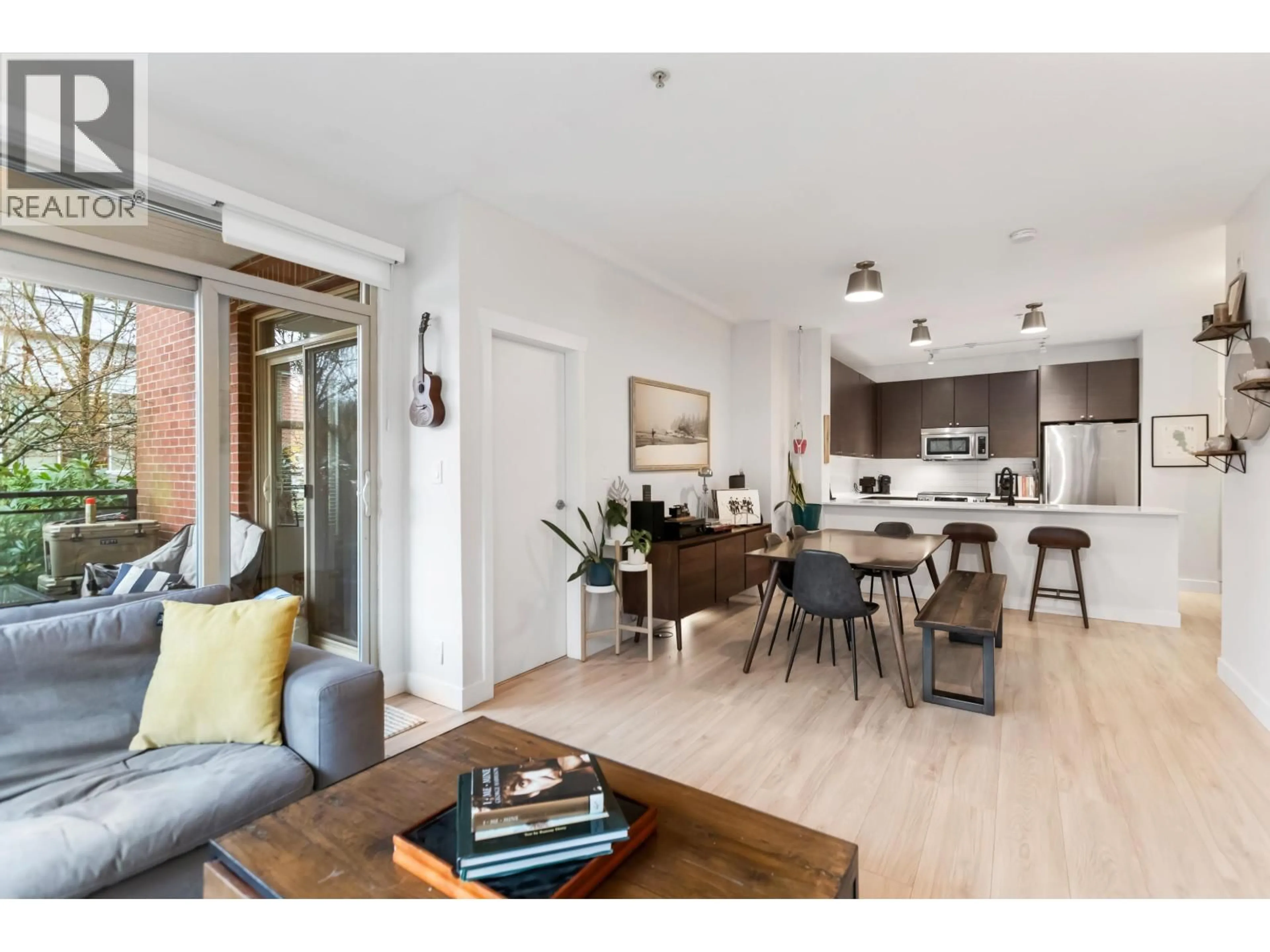 Open concept kitchen, wood/laminate floor for 112 - 101 MORRISSEY ROAD, Port Moody British Columbia V3H0E6