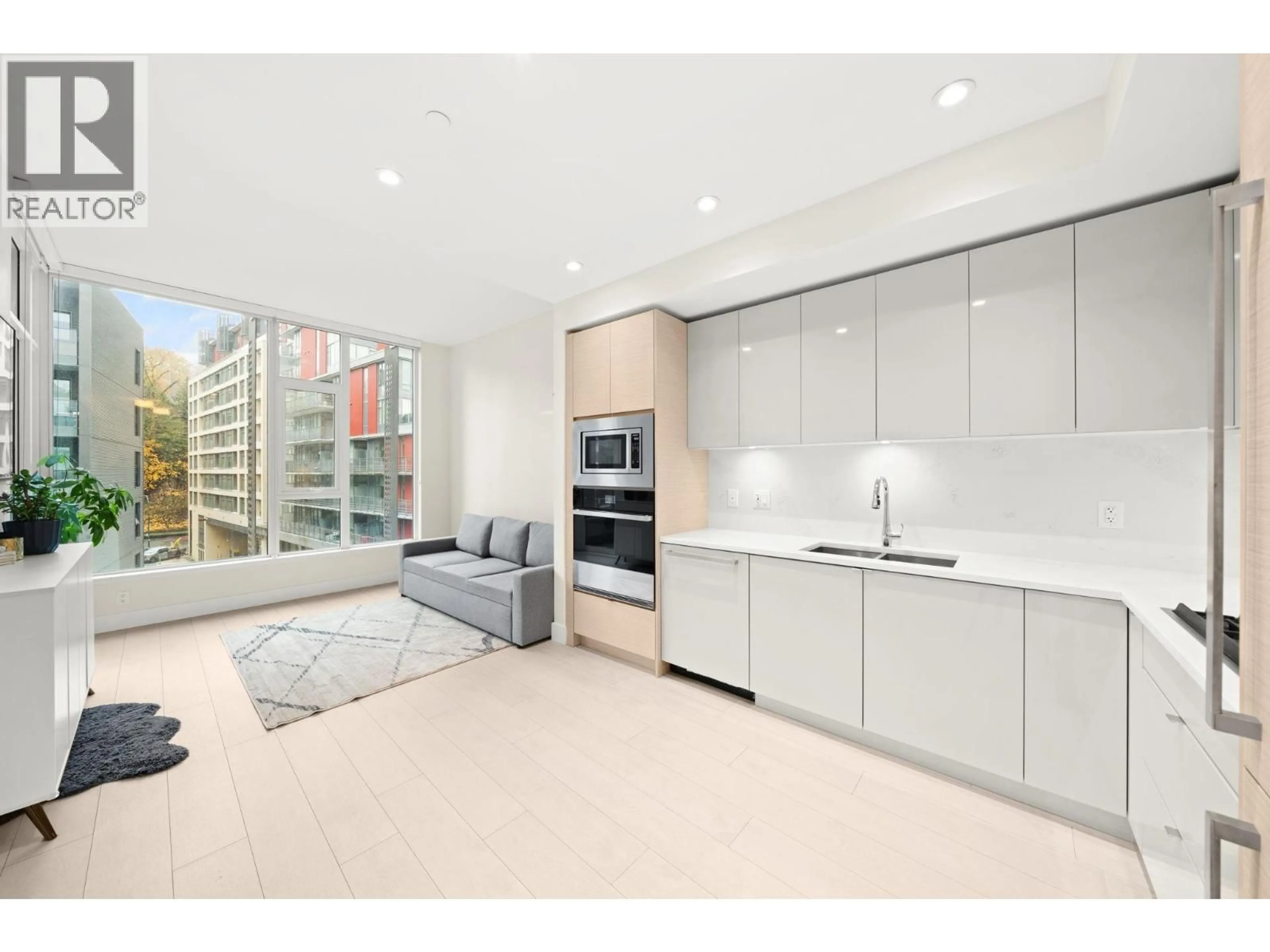 Open concept kitchen, unknown for 519 - 3438 SAWMILL CRESCENT, Vancouver British Columbia V5S0E3