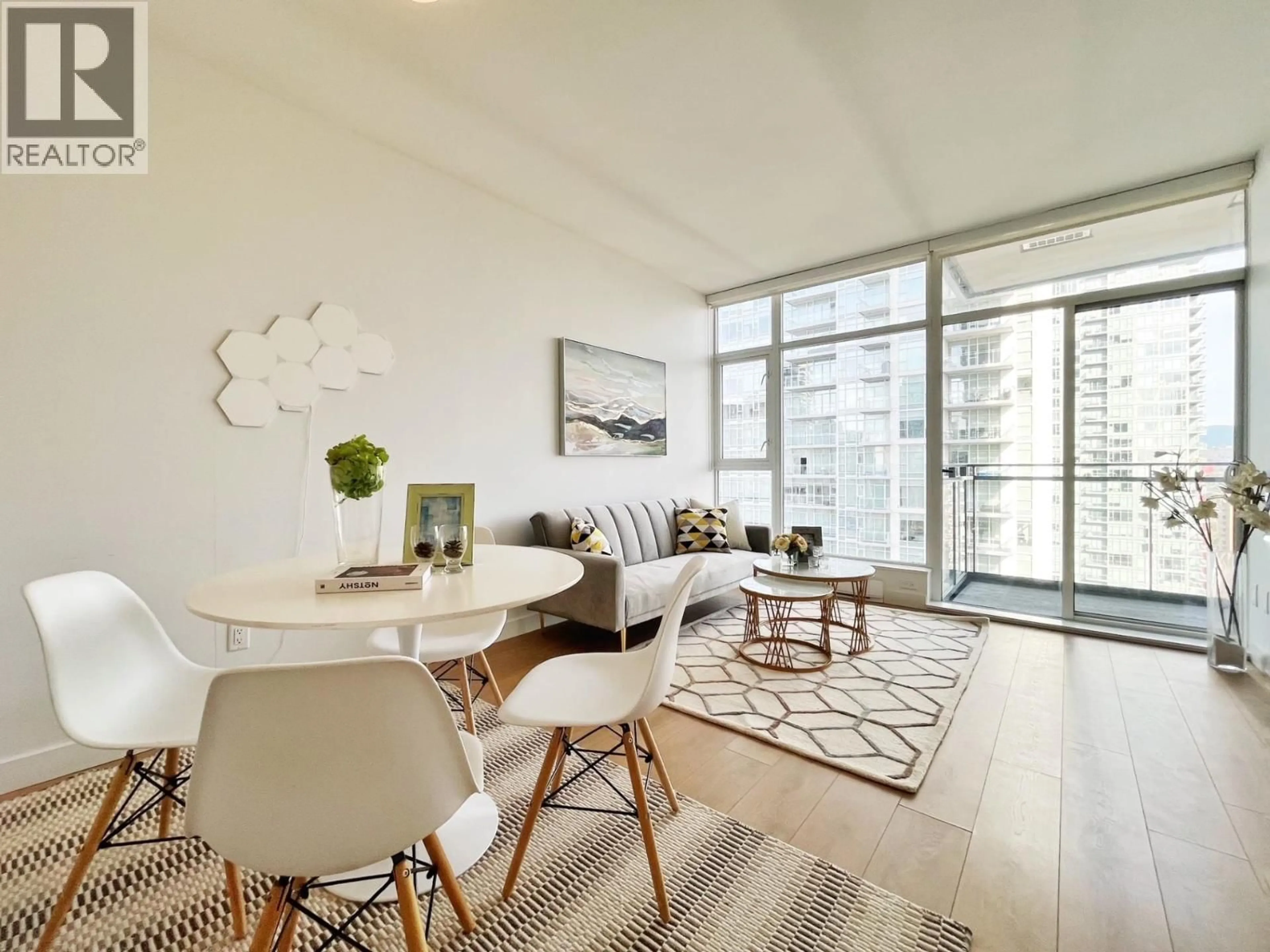 Living room with furniture, wood/laminate floor for 2308 - 6098 STATION STREET, Burnaby British Columbia V5H0H4