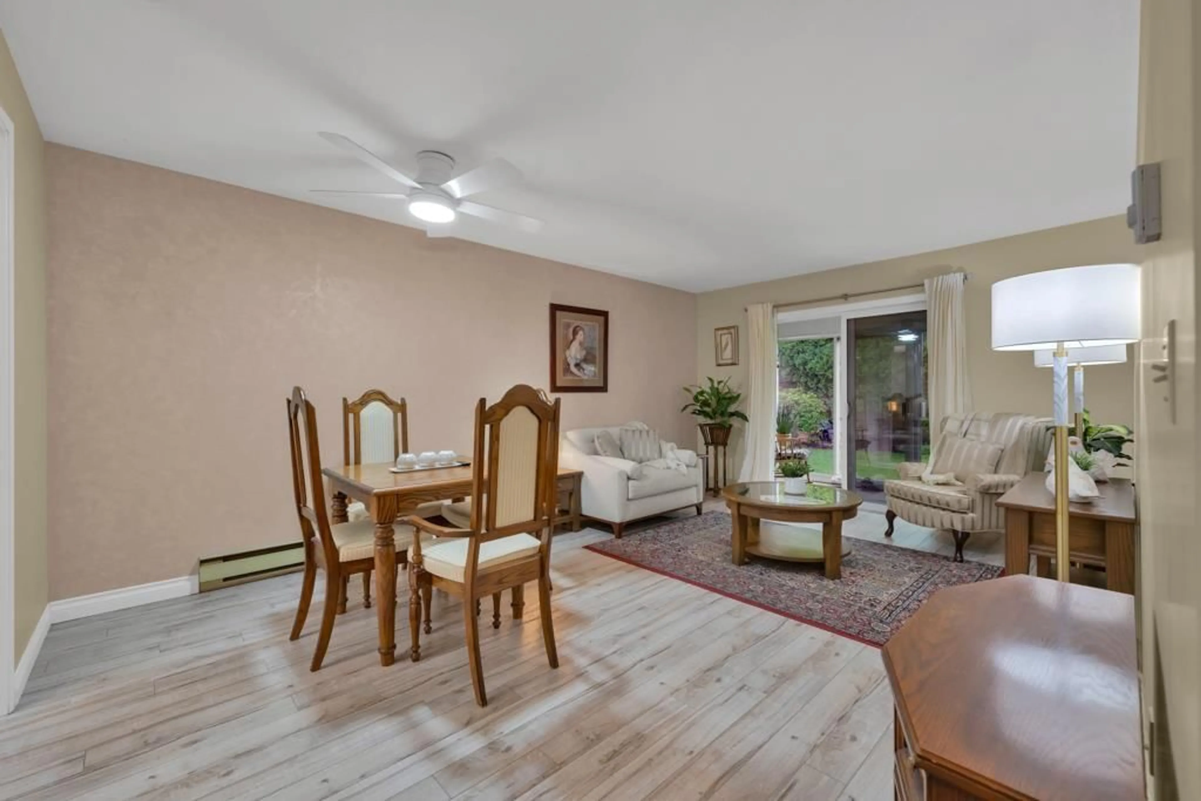 Living room with furniture, wood/laminate floor for 15 - 7525 MARTIN PLACE, Mission British Columbia V2V6N2