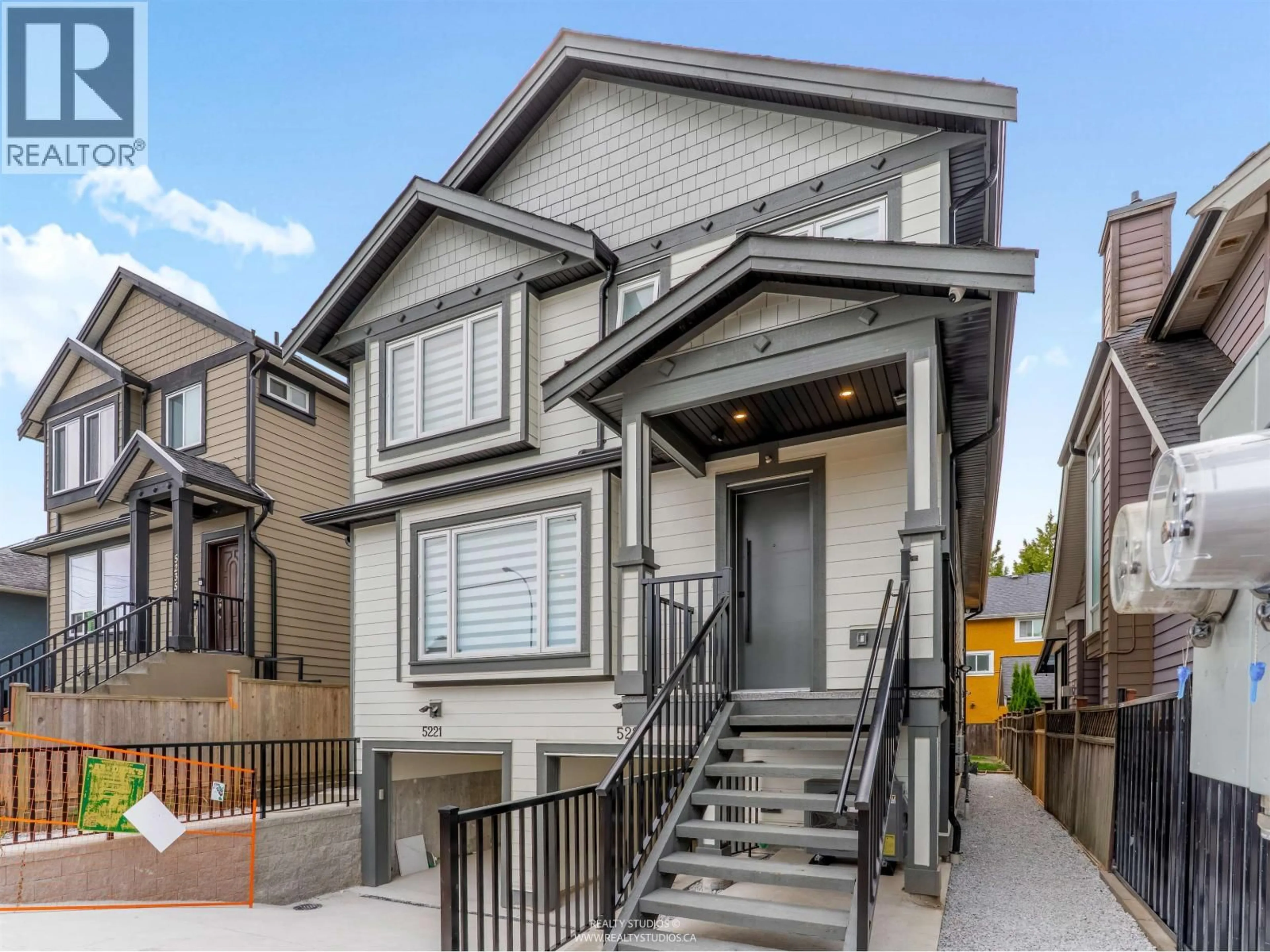 Home with vinyl exterior material, street for 1 - 5221 CLARENDON STREET, Vancouver British Columbia V5R3J7