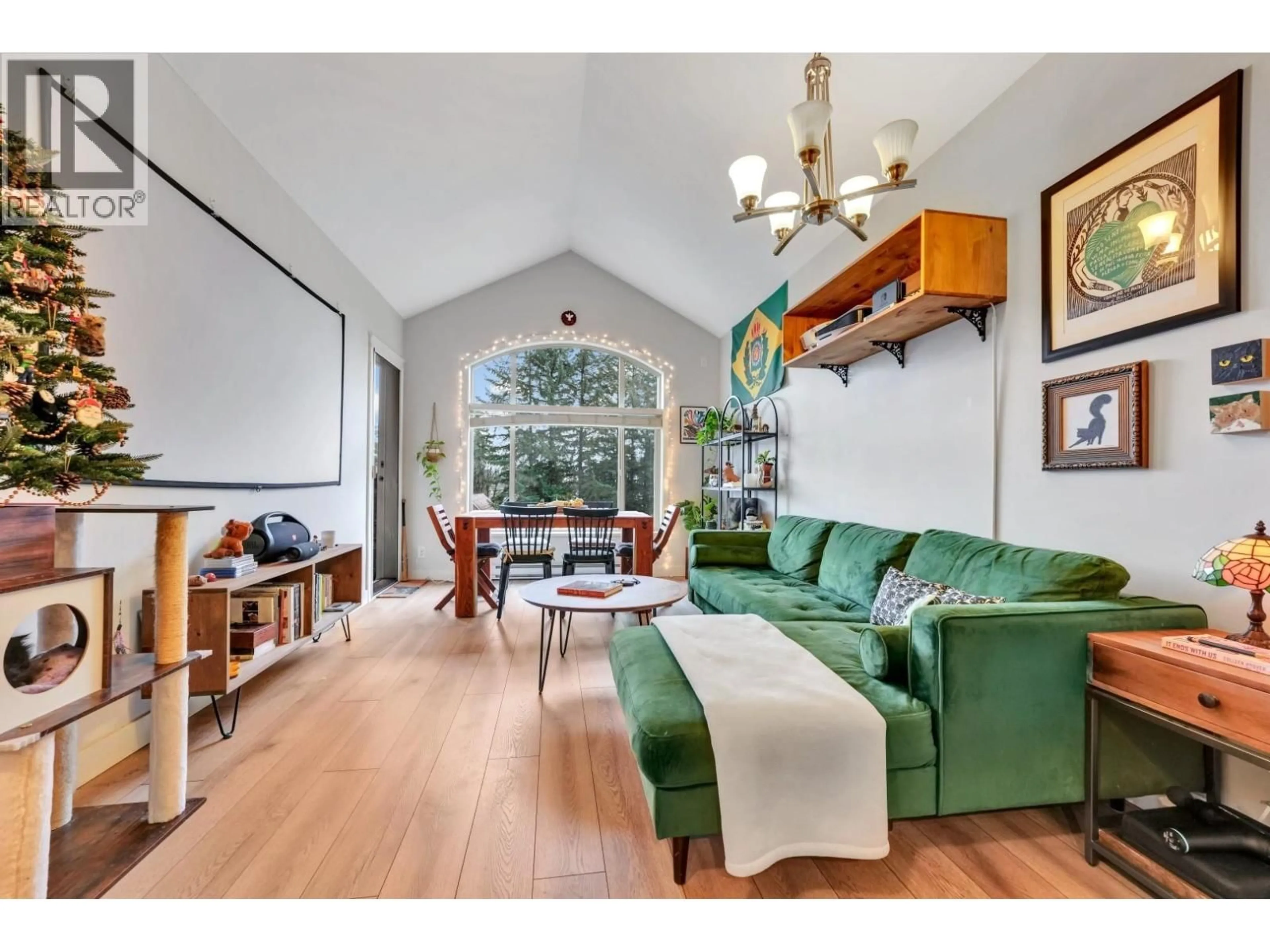 Living room with furniture, wood/laminate floor for 411 - 12525 190A STREET, Pitt Meadows British Columbia V3Y0E1