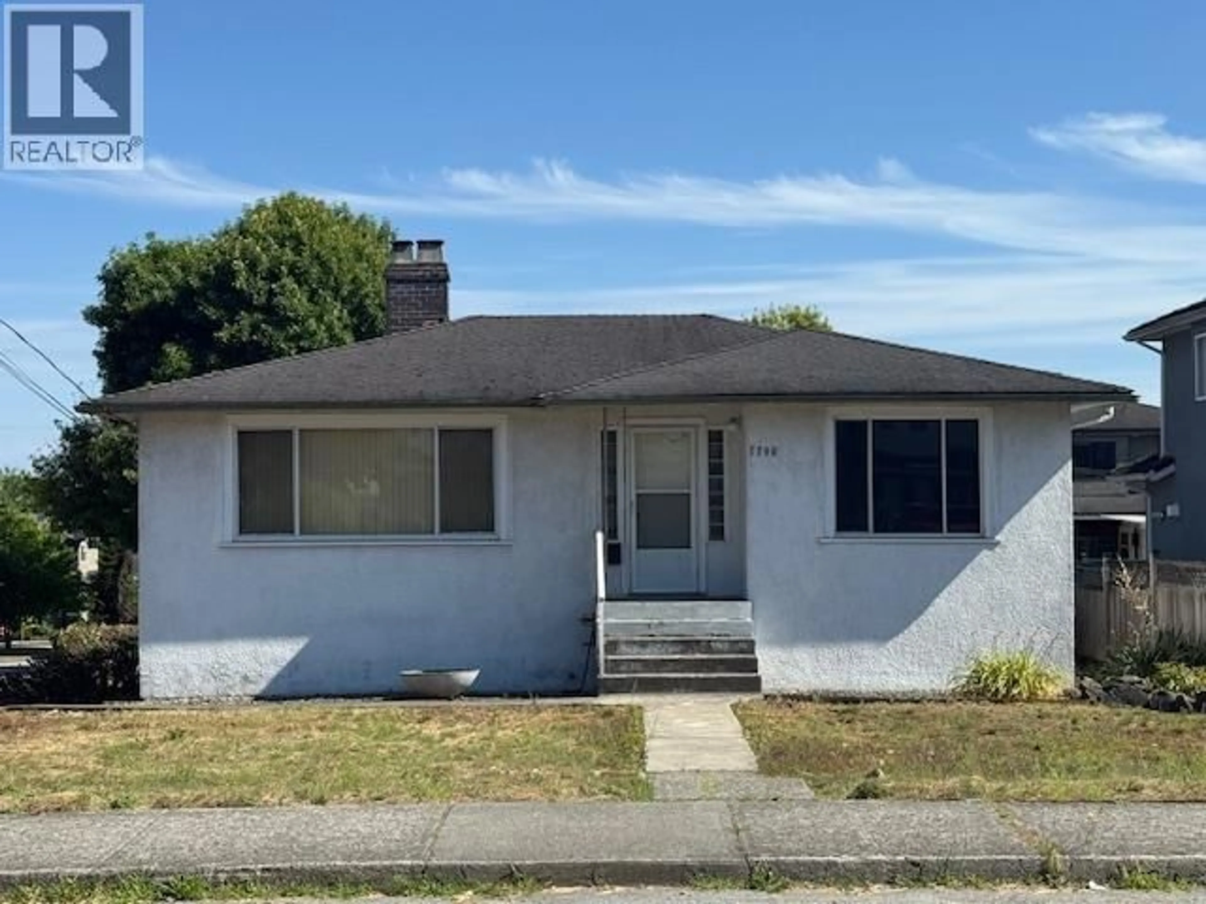 Home with vinyl exterior material, street for 7790 15TH AVENUE, Burnaby British Columbia V3N1W5