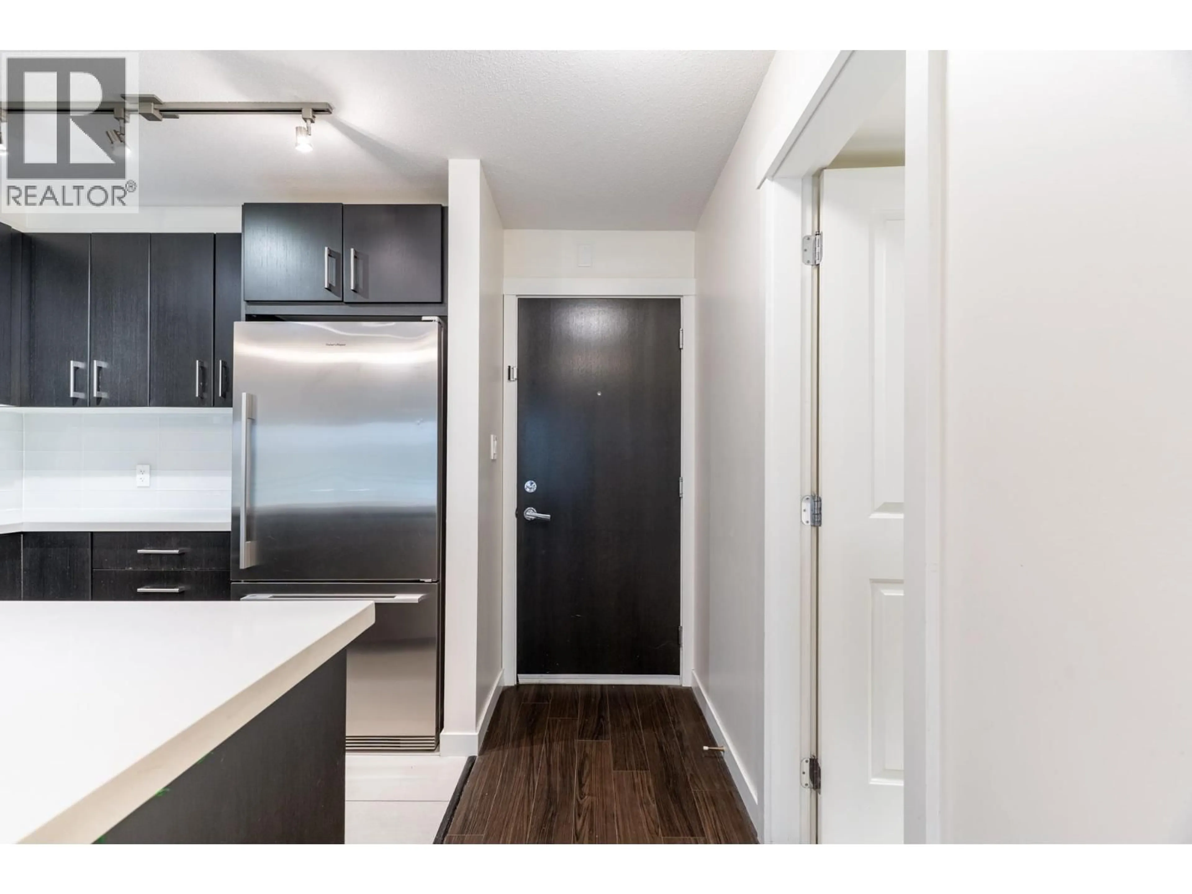 Standard kitchen, wood/laminate floor for 207 - 3133 RIVERWALK AVENUE, Vancouver British Columbia V5S0A7