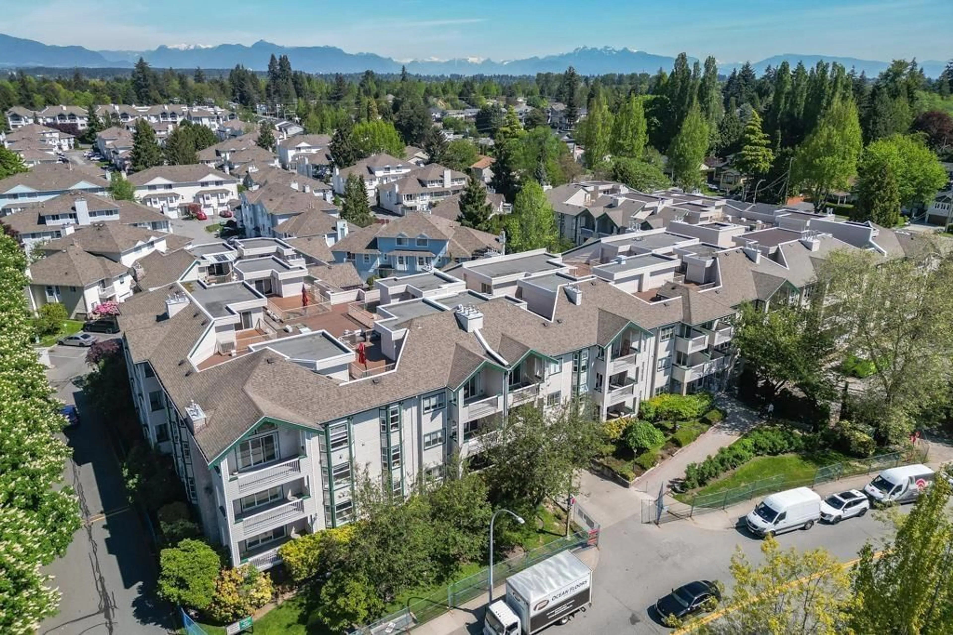 A pic from outside/outdoor area/front of a property/back of a property/a pic from drone, mountain view for 320 - 13911 70, Surrey British Columbia V3W6B4