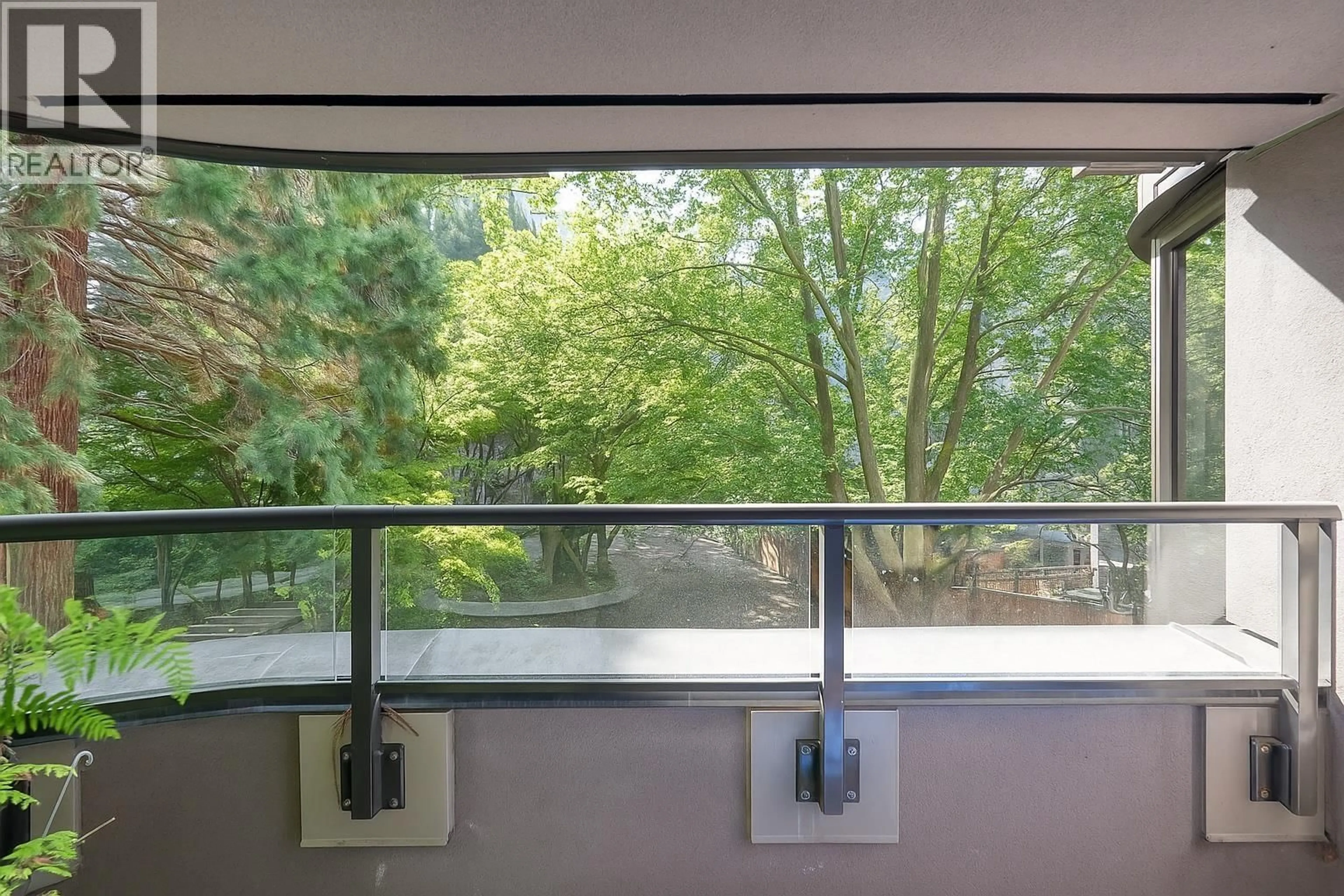 Balcony in the apartment, forest/trees view for 41 - 1425 LAMEY'S MILL ROAD, Vancouver British Columbia V6H3W2