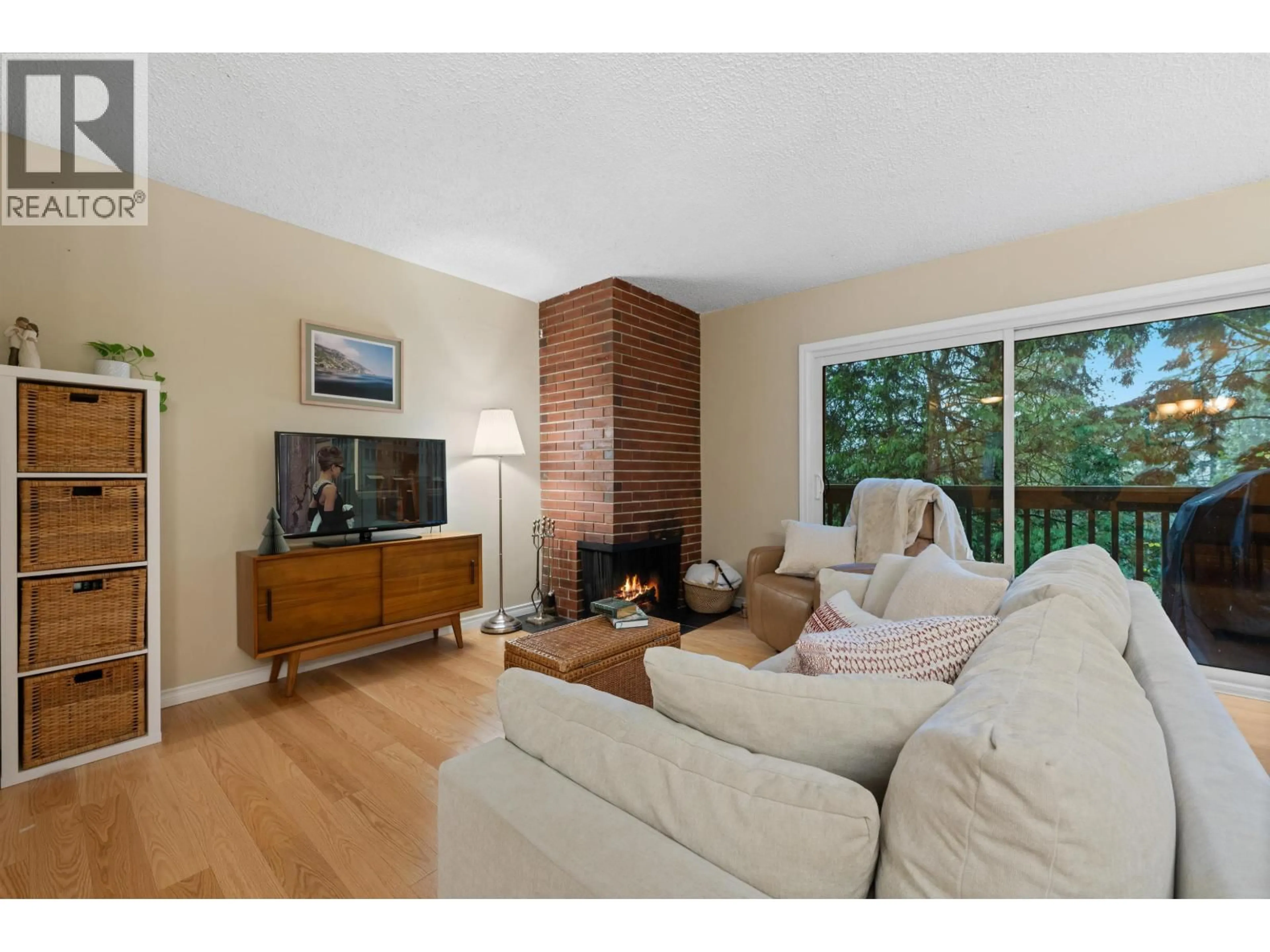 Living room with furniture, wood/laminate floor for 335A EVERGREEN DRIVE, Port Moody British Columbia V3H1S1