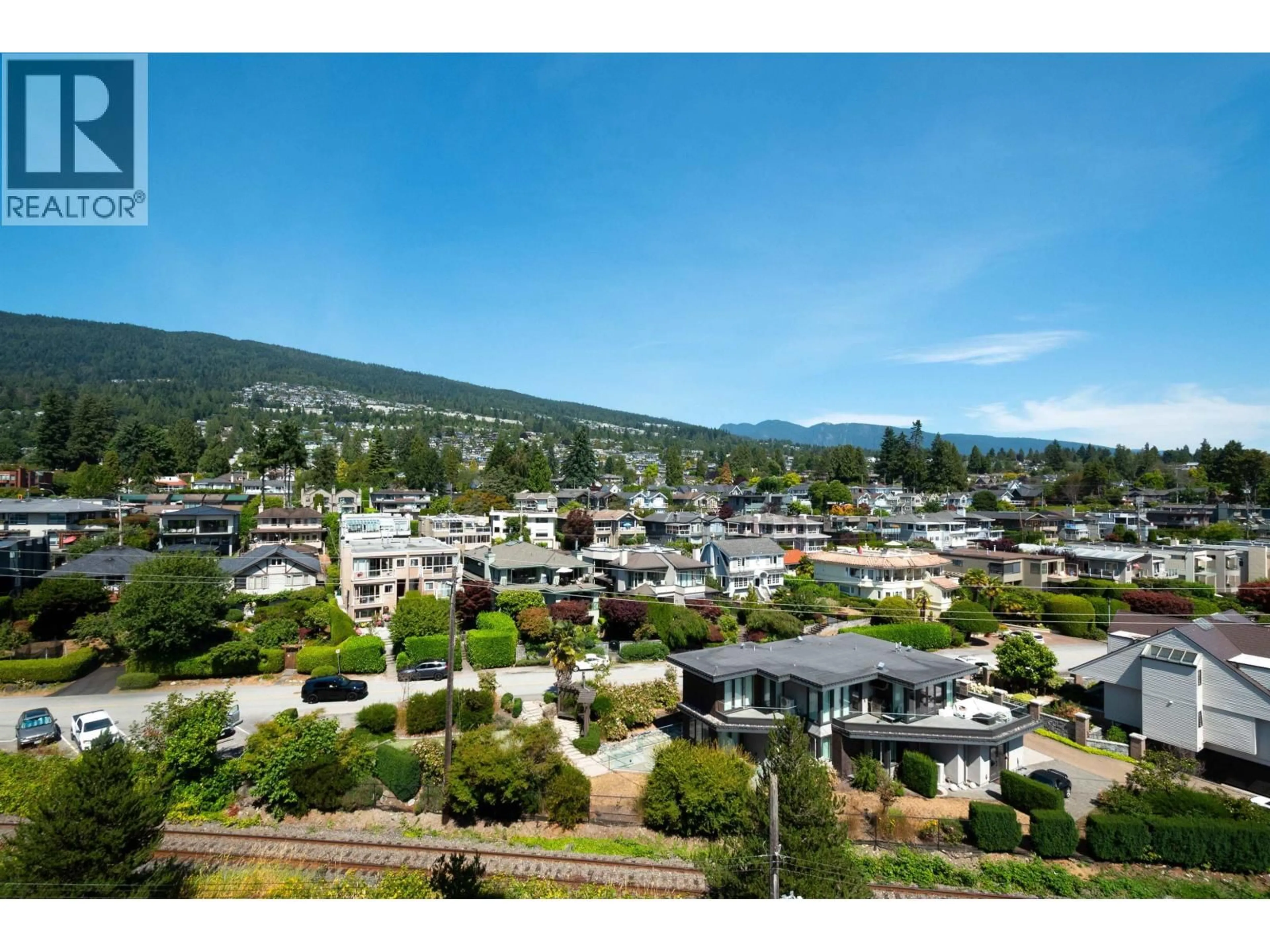 A pic from outside/outdoor area/front of a property/back of a property/a pic from drone, mountain view for 708 - 150 24TH STREET, West Vancouver British Columbia V7V4G8