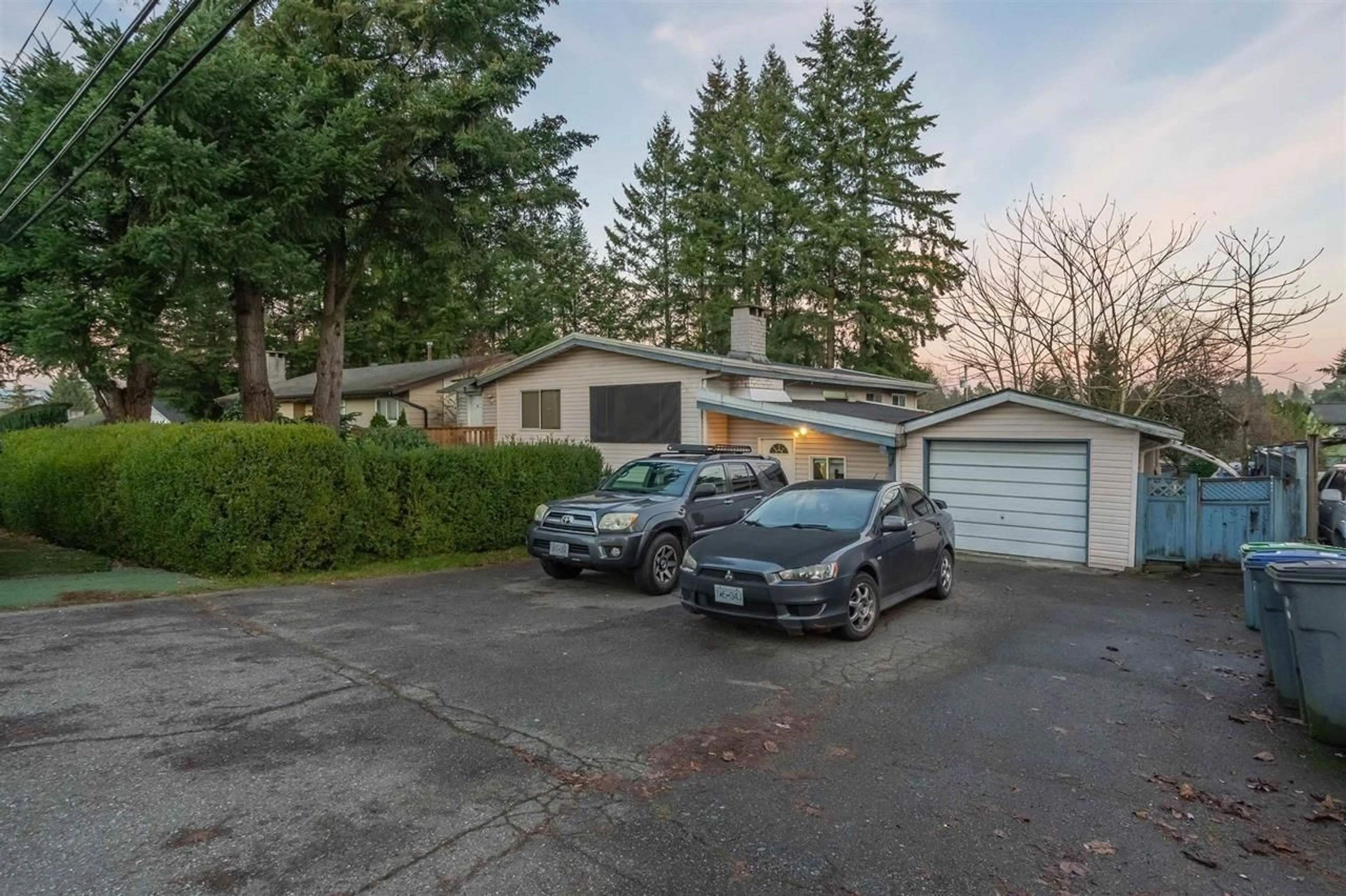A pic from outside/outdoor area/front of a property/back of a property/a pic from drone, street for 11084 148 STREET, Surrey British Columbia V3R3Y8