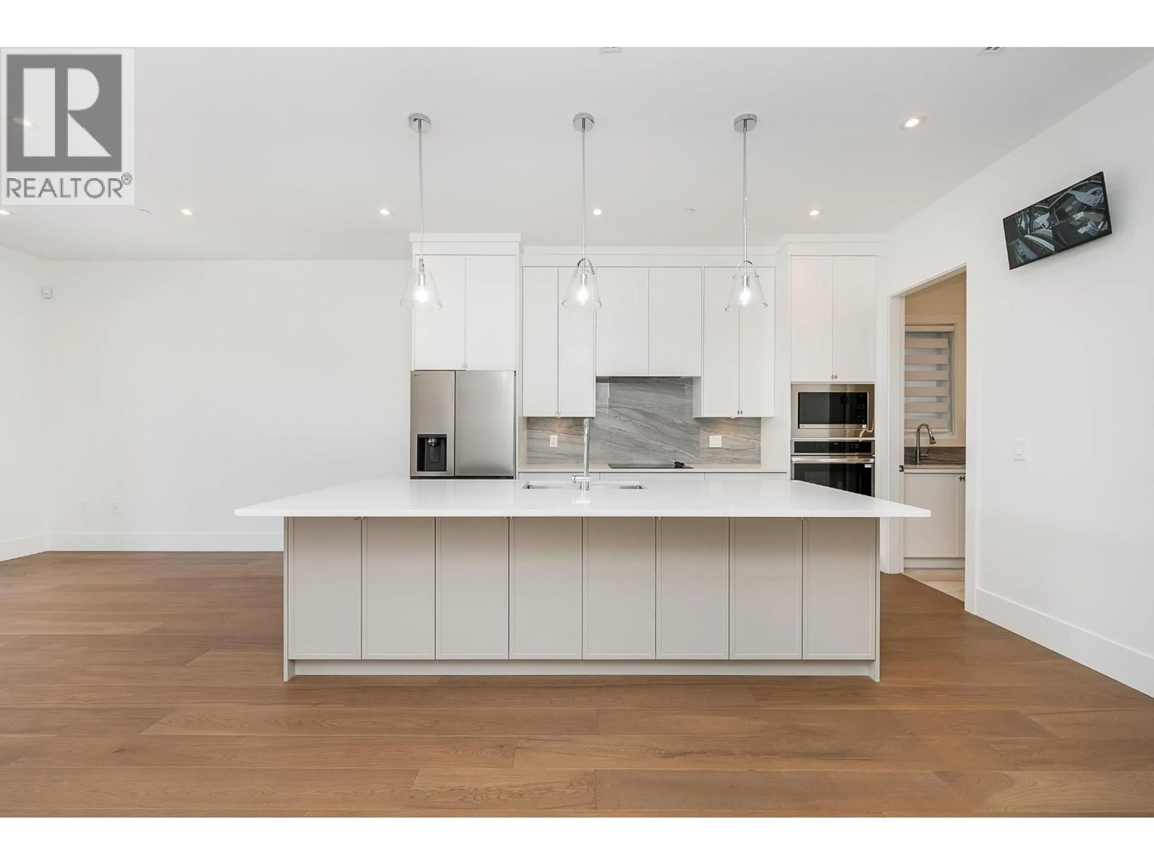 Open concept kitchen, wood/laminate floor for 3380 EDINBURGH STREET, Port Coquitlam British Columbia V3B4K1