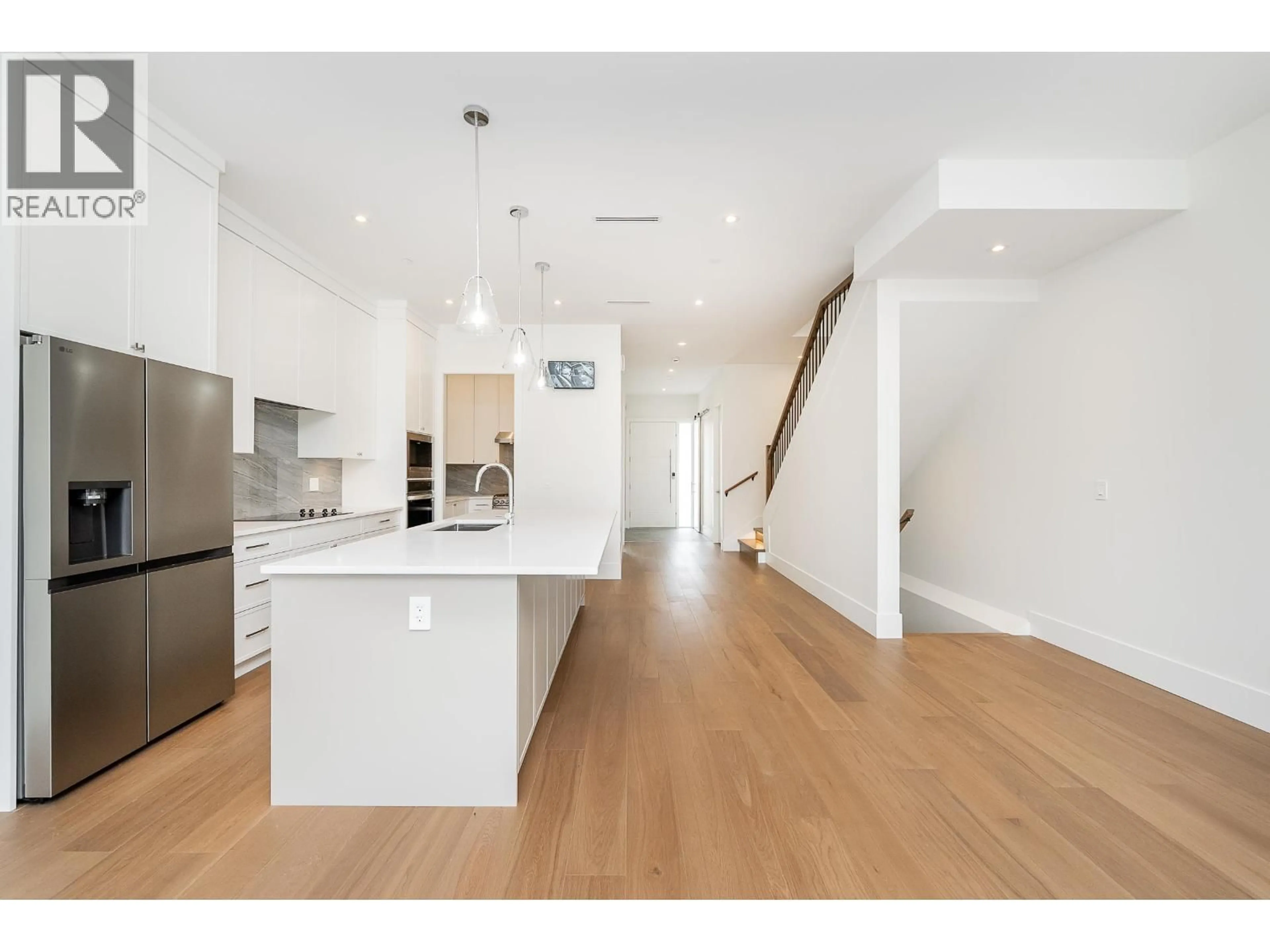 Open concept kitchen, wood/laminate floor for 3380 EDINBURGH STREET, Port Coquitlam British Columbia V3B4K1