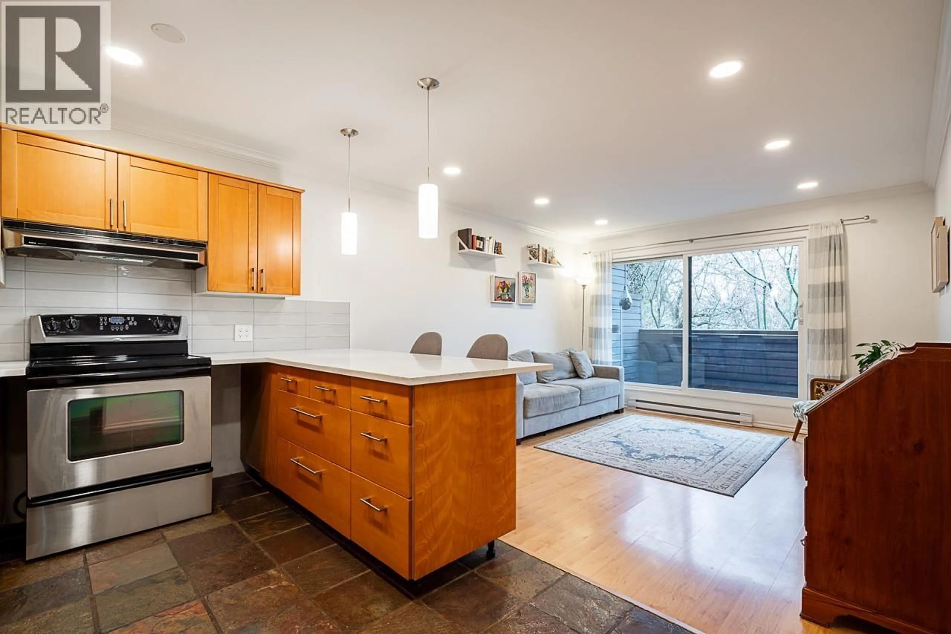 Open concept kitchen, unknown for 218 - 1990 6TH AVENUE, Vancouver British Columbia V6J4V4