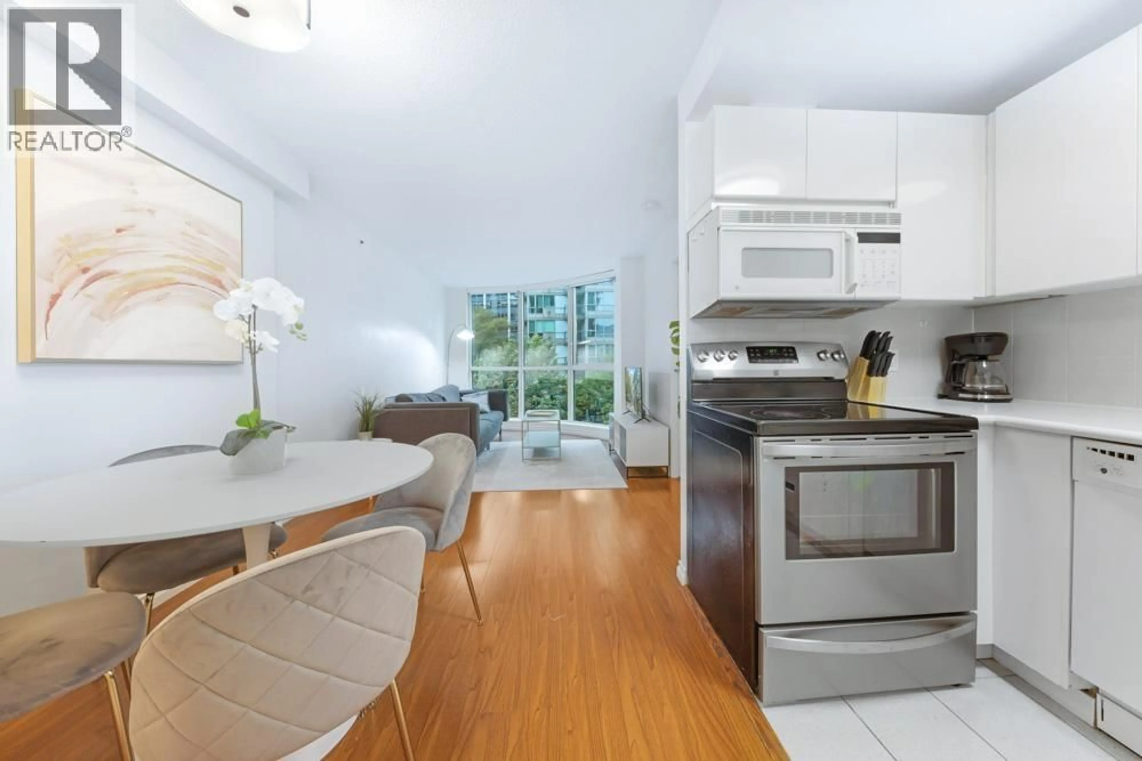 Open concept kitchen, unknown for 507 - 555 JERVIS STREET, Vancouver British Columbia V6E4N1