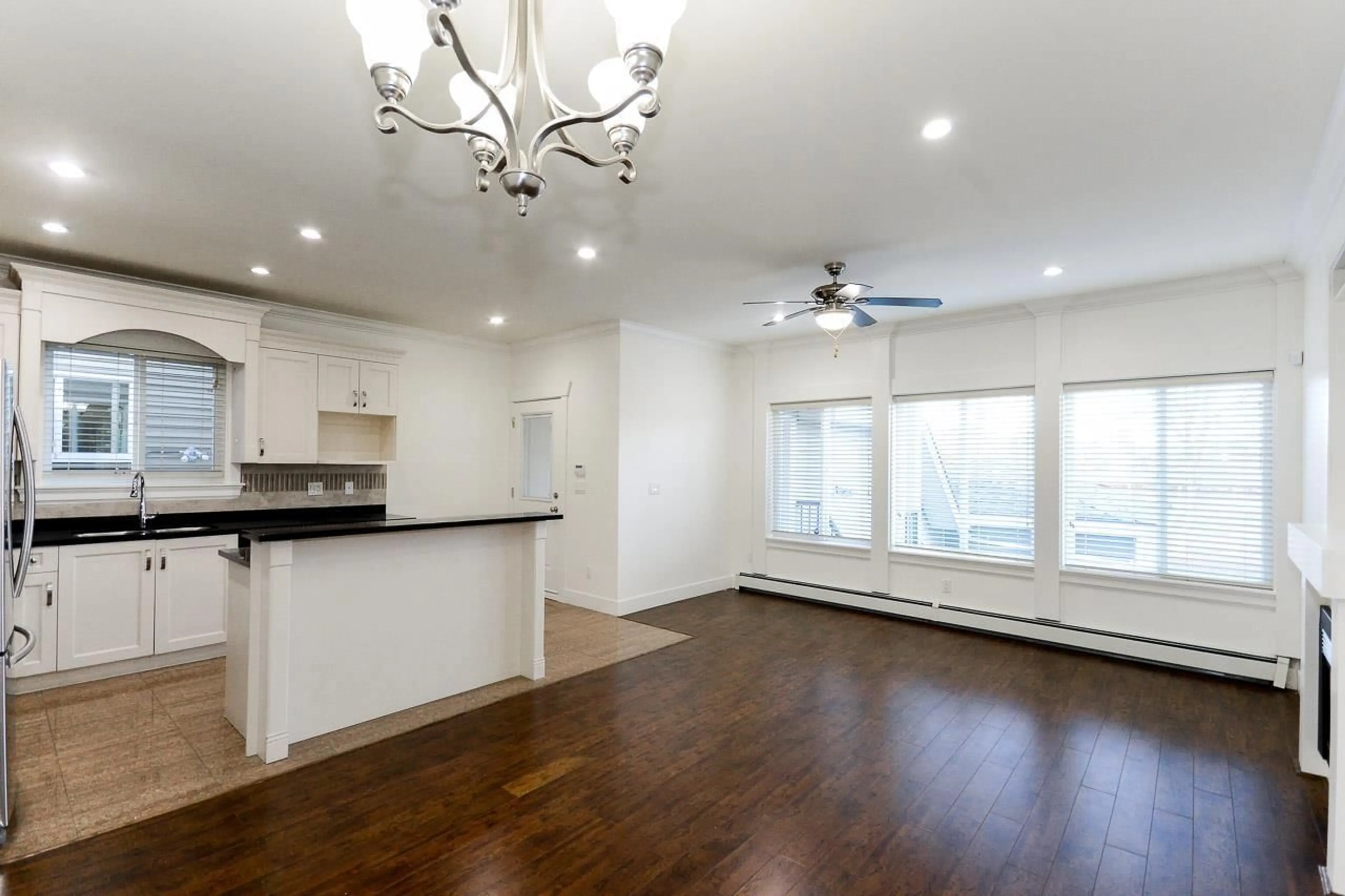 Open concept kitchen, wood/laminate floor for 13111 108, Surrey British Columbia V3T2J2